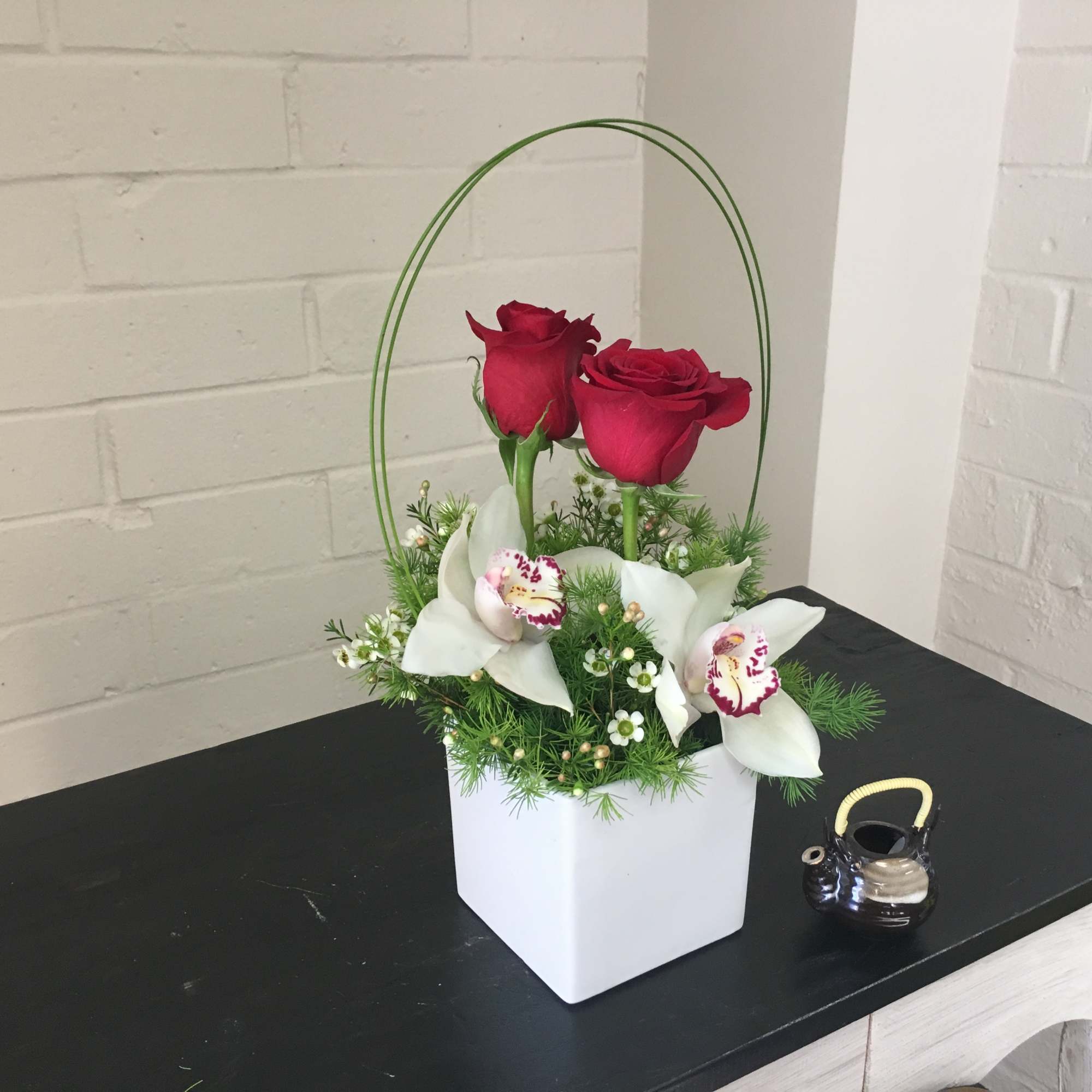 Dimensions:  13H x 5L x 5W  Classic Roses, Orchids, Wax