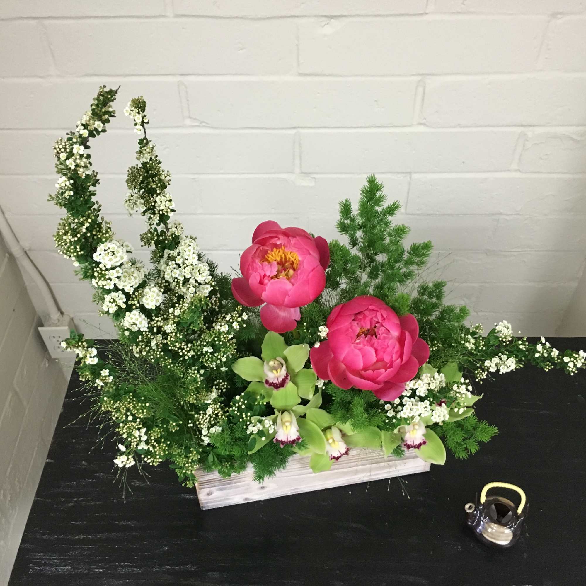 Dimensions:  12L x 4W x 20H  Elegant arrangement with Peonies
