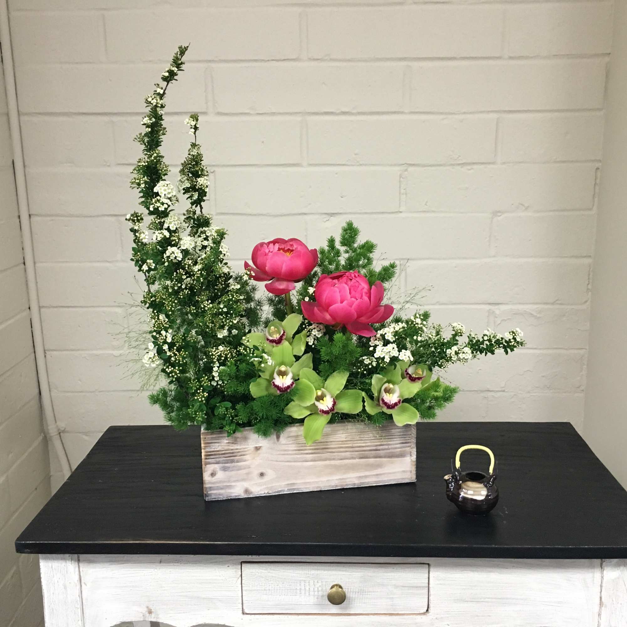 Dimensions:  12L x 4W x 20H  Elegant arrangement with Peonies