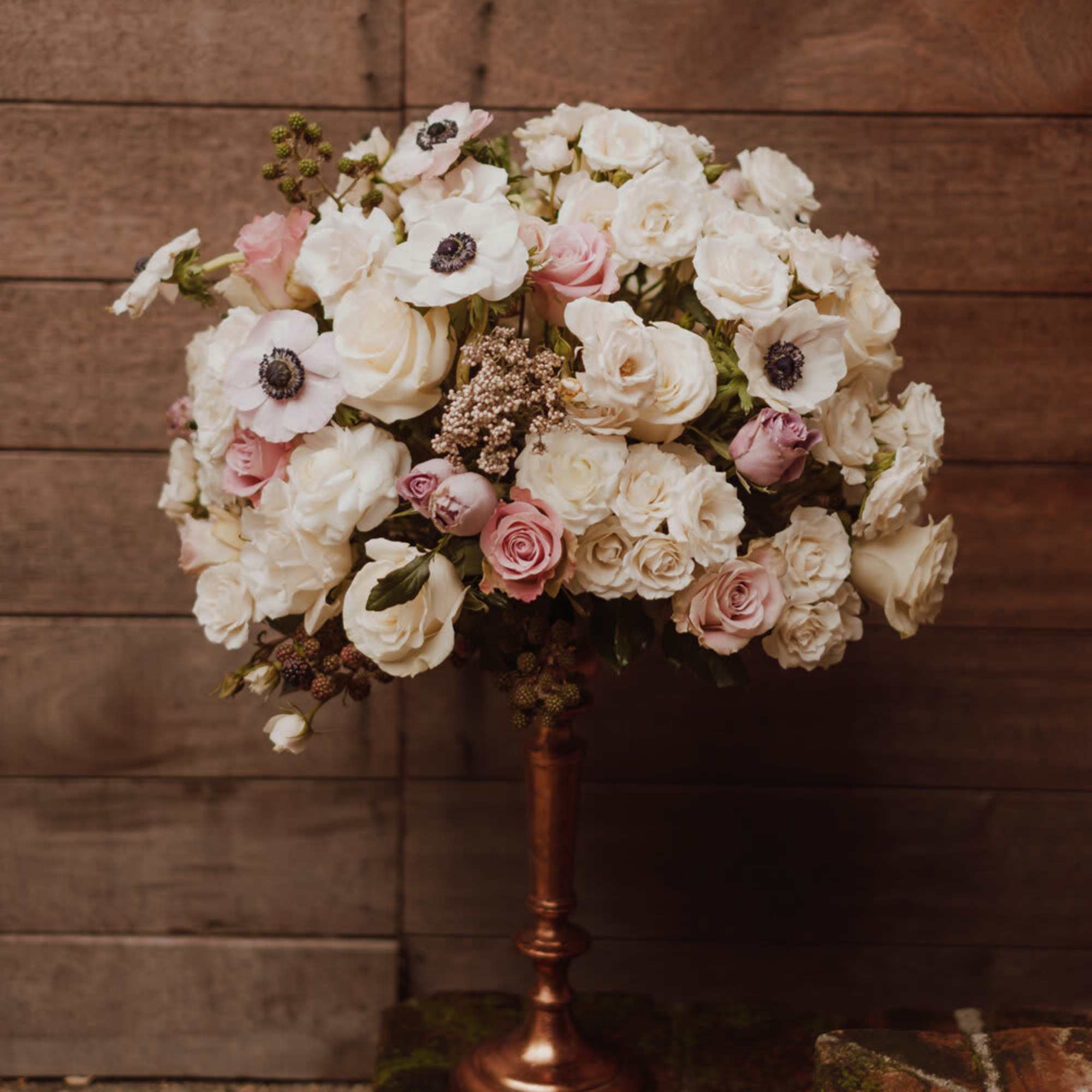 A floral centerpiece brings the whole table together, exuding elegance and natural