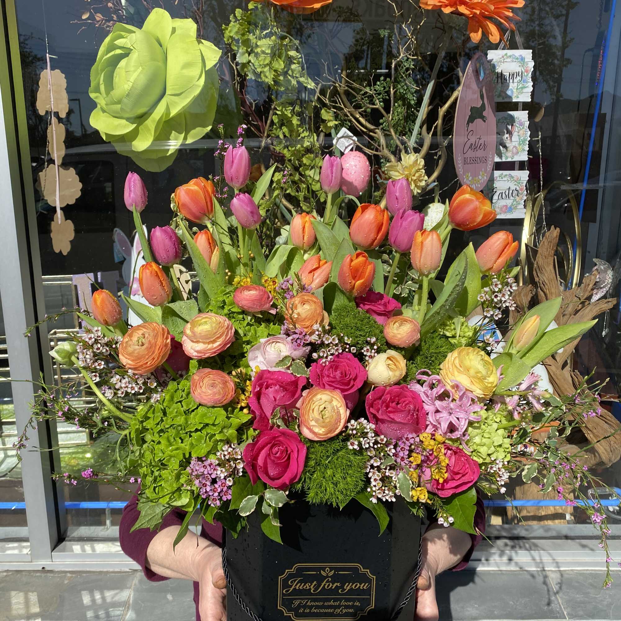 Tulips roses Renanculus viburnum mixed flowers