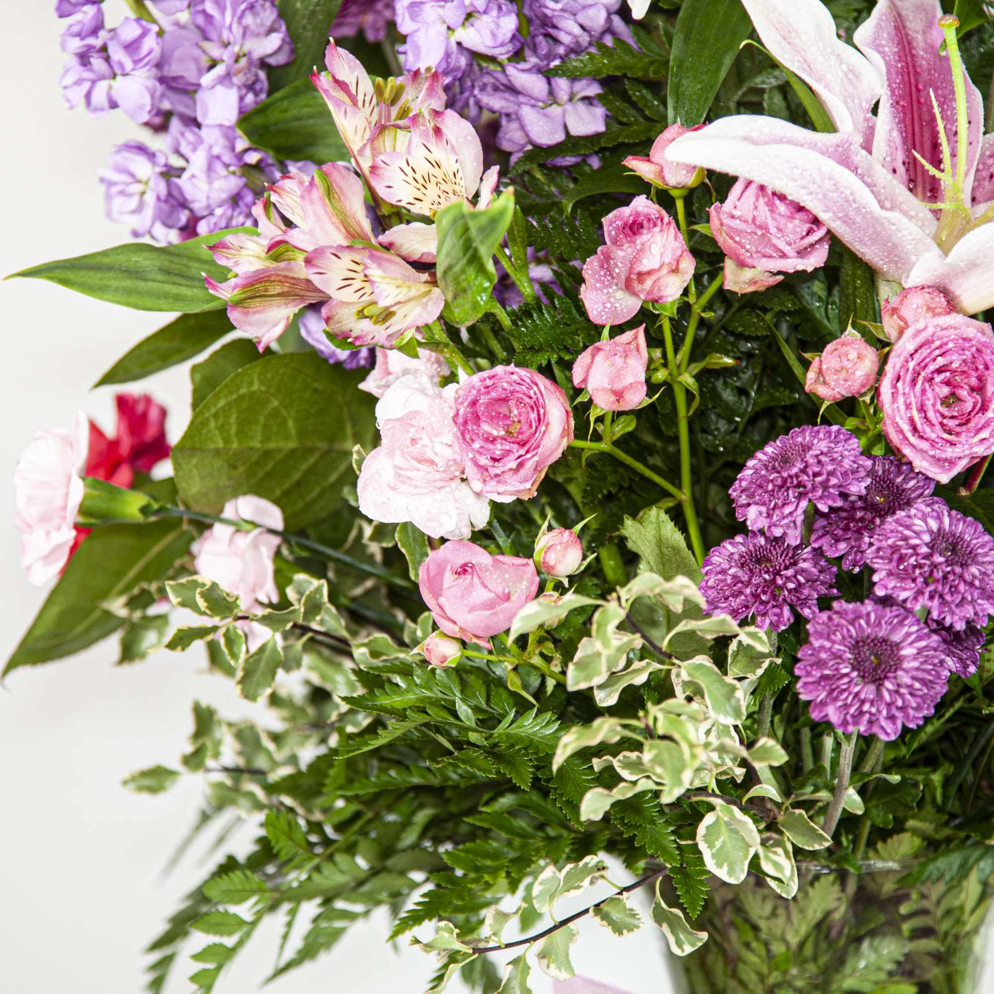 Immerse yourself into the spring season with this large and full-of-life centerpiece Immerse yourself into the spring season with this large and full-of-life centerpiece