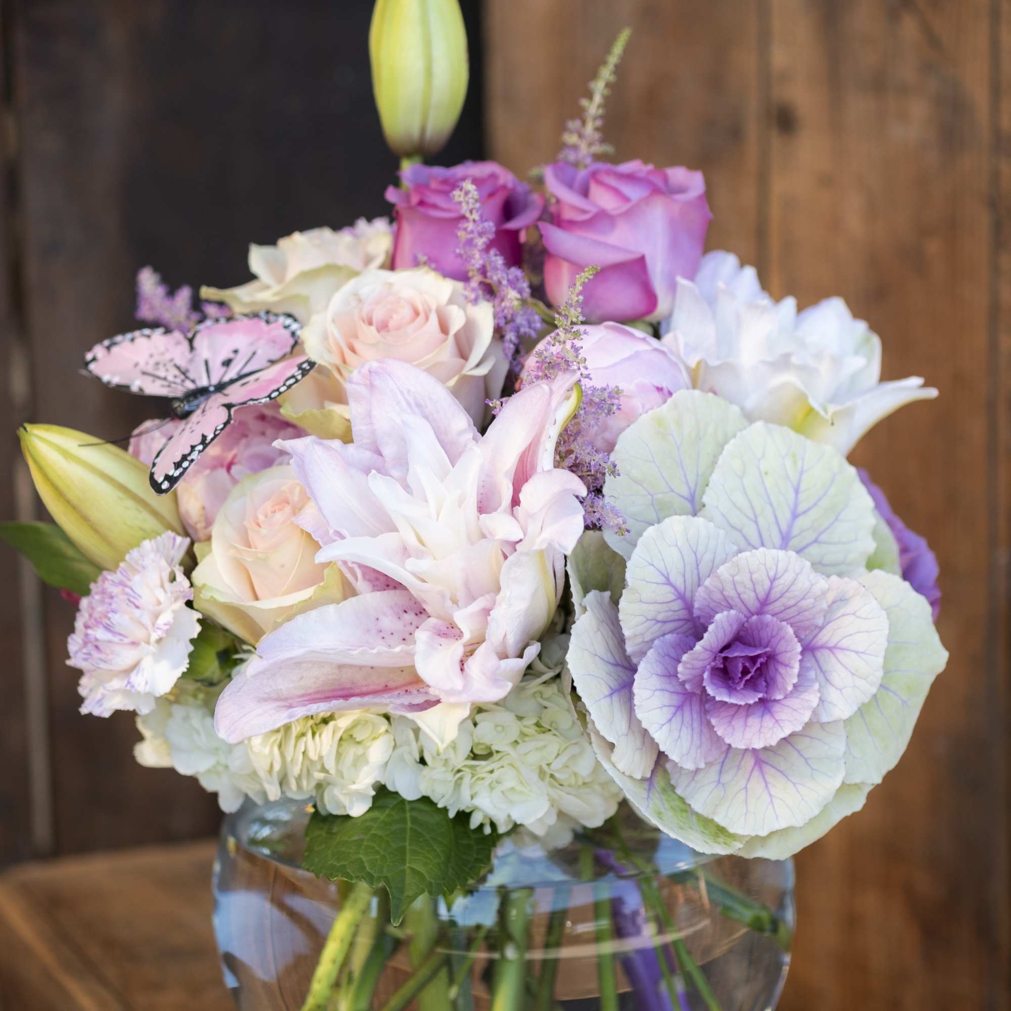 Our artisan handmade arrangement&#039;s overall theme is different shades of pink. The