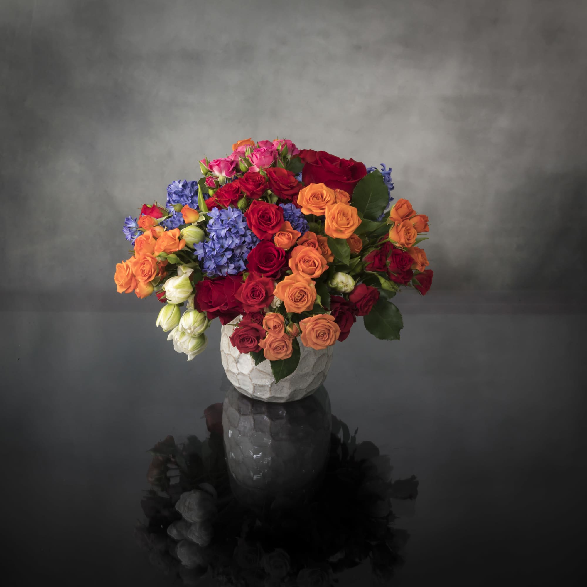 Let one of our talented designers put together a beautiful summer arrangement