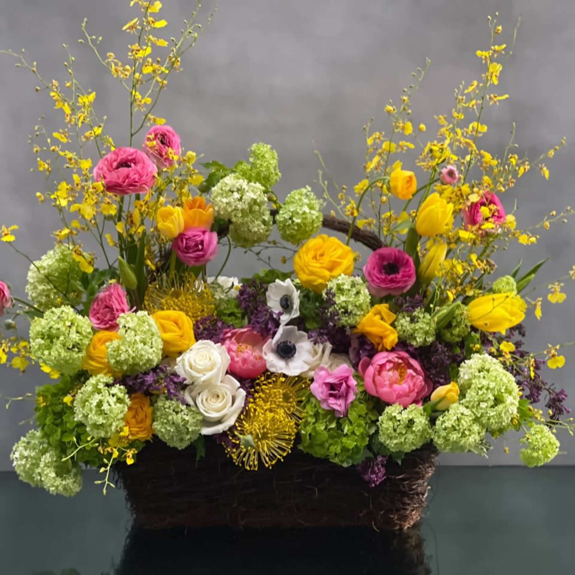 This beautiful basket of happiness will certainly bring a smile to anyone!