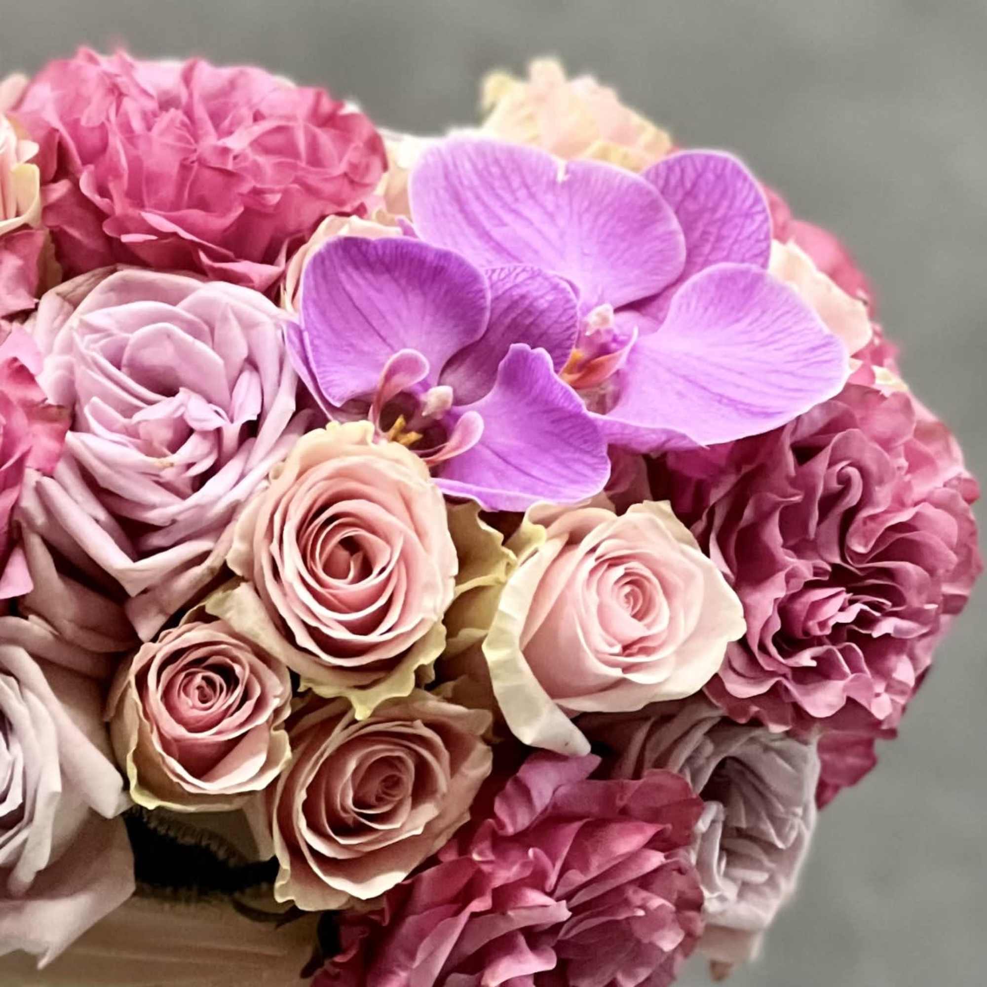 Preciously Pink! This delightful design features an array of 50 pink Roses