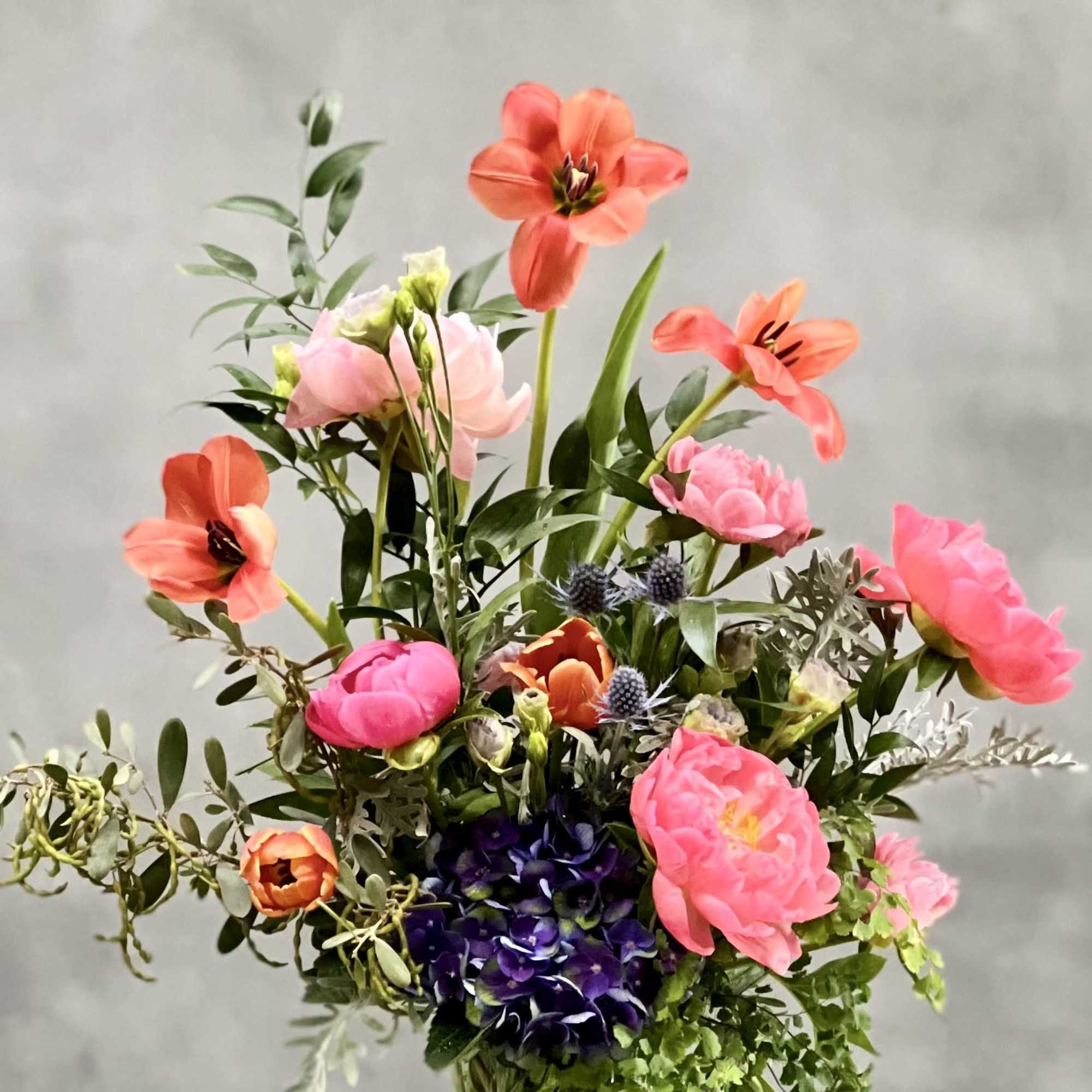 Fabulously faceted to catch anyone&#039;s eye! Bursting with  peonies, Tulips, and