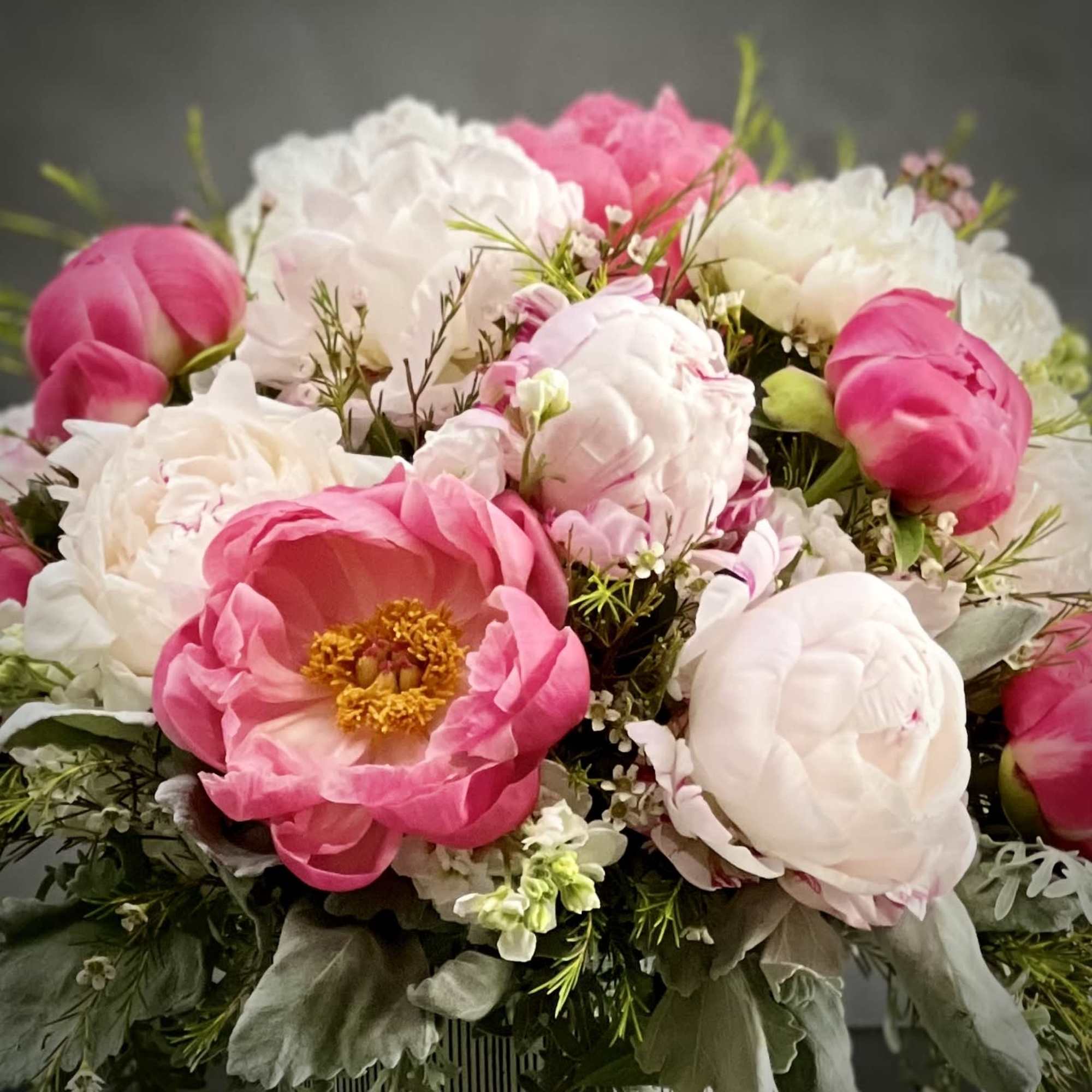 Full, fluffy, fresh, and gorgeous! These delicate coral Peonies can stand alone