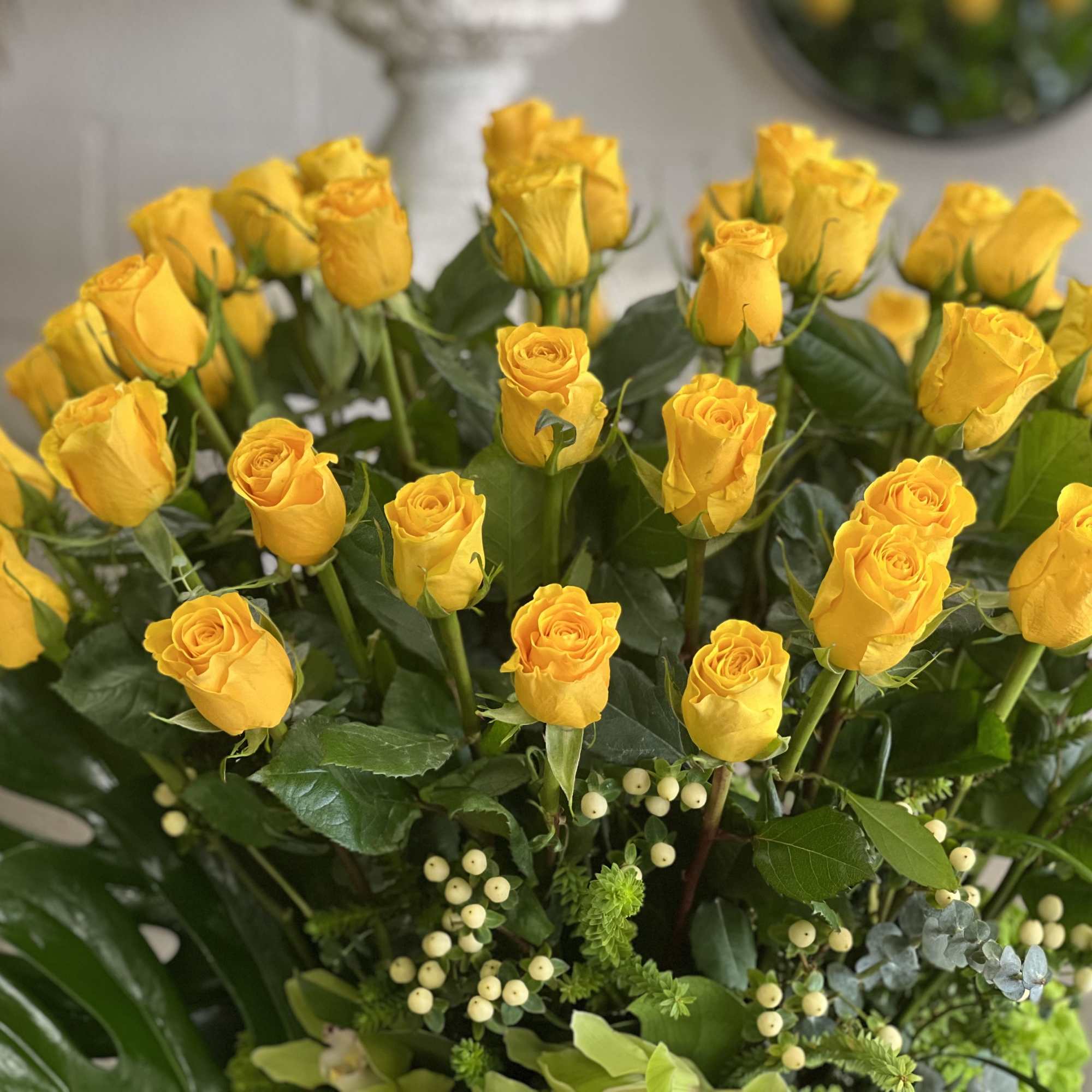 Yellow roses modern vase.
*vase subject to availability
