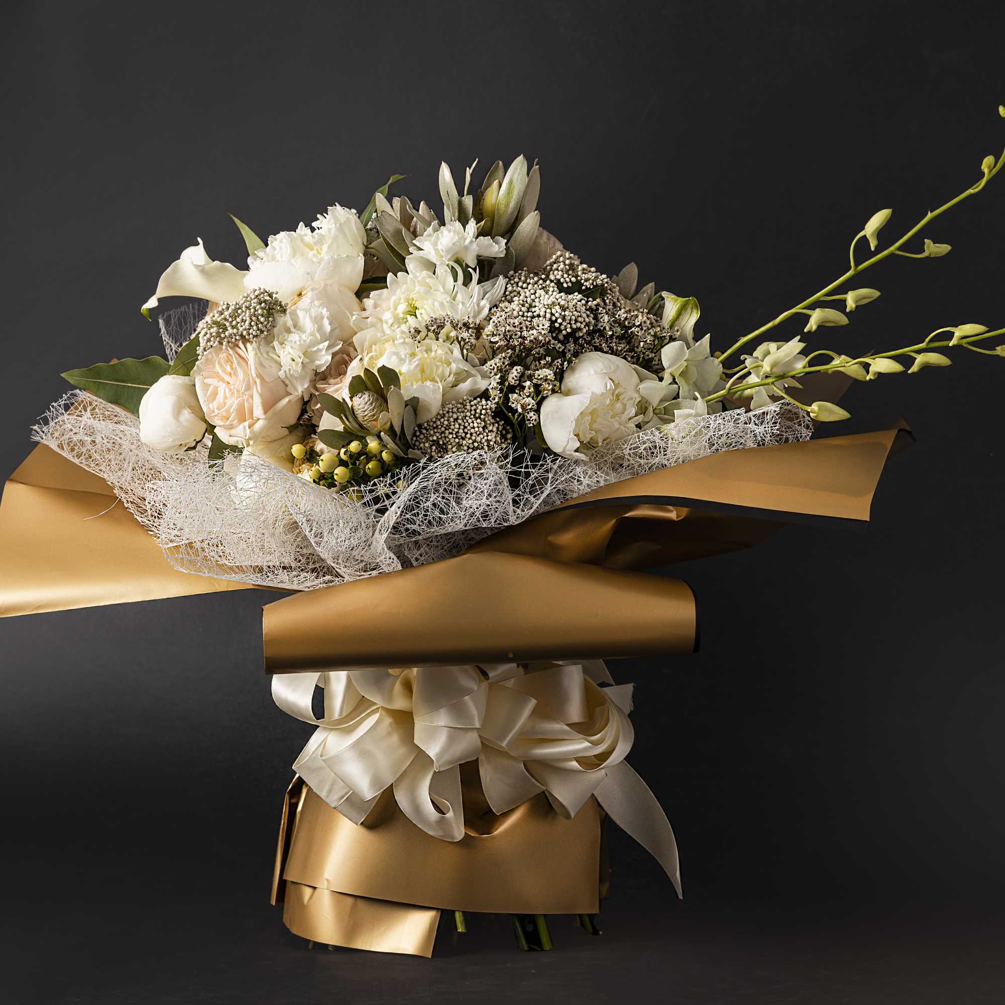 Variety of luxury flowers, including some tropical. Will be delivered approximately like