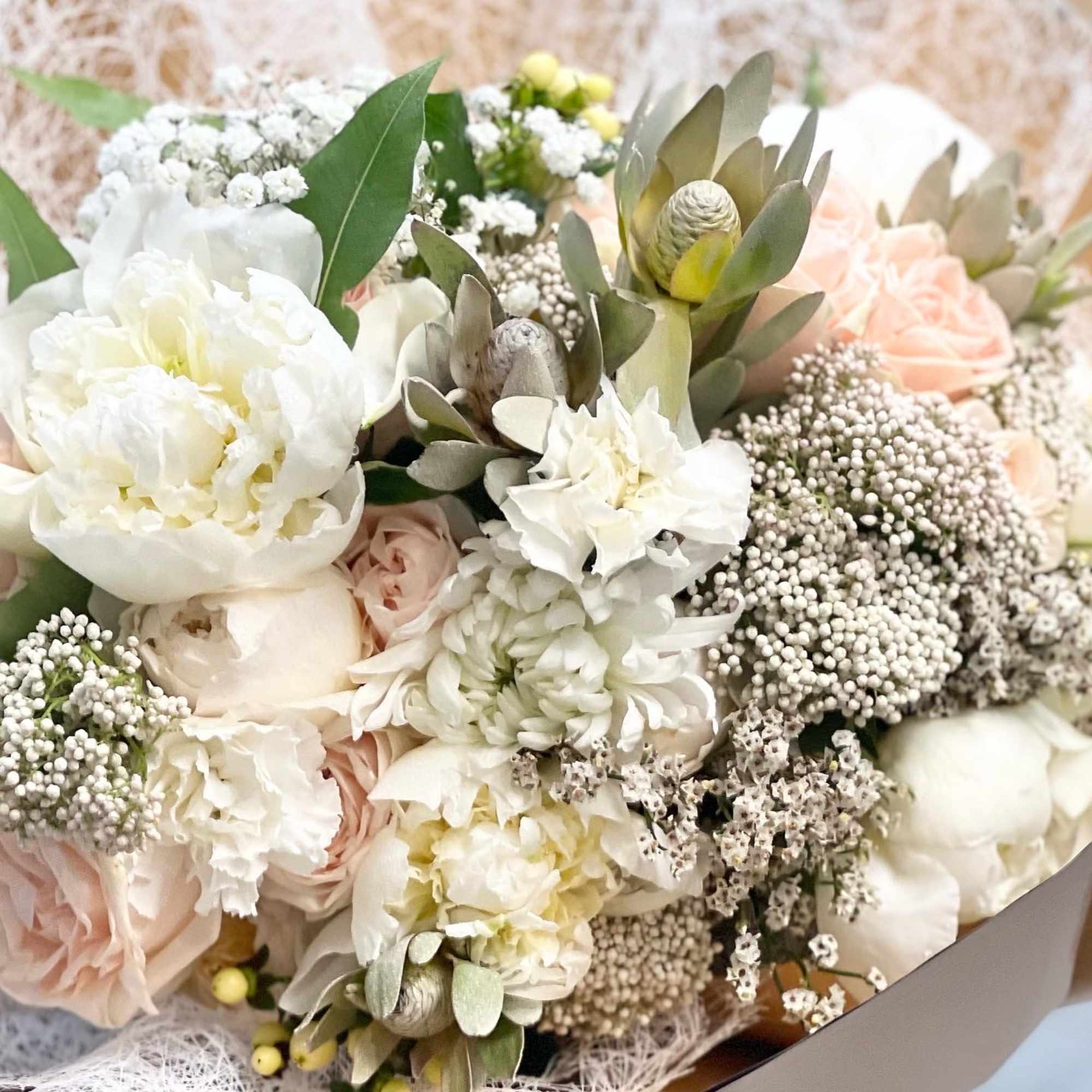 Variety of luxury flowers, including some tropical. Will be delivered approximately like