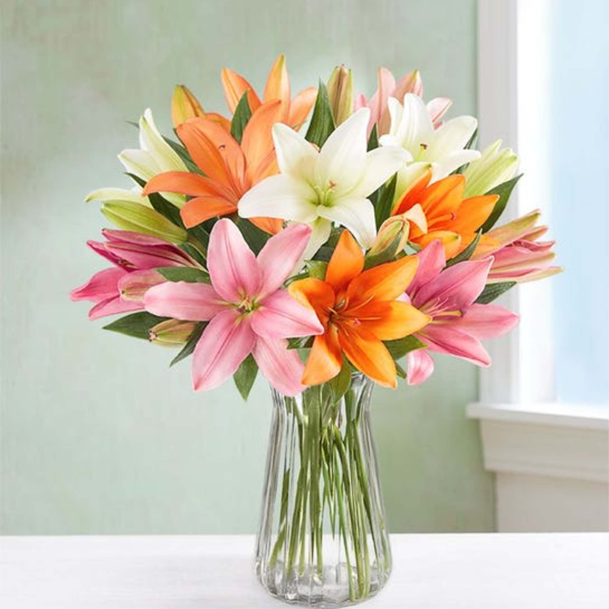 The vibrant beauty of summer comes alive in our lily bouquet. Star-shaped