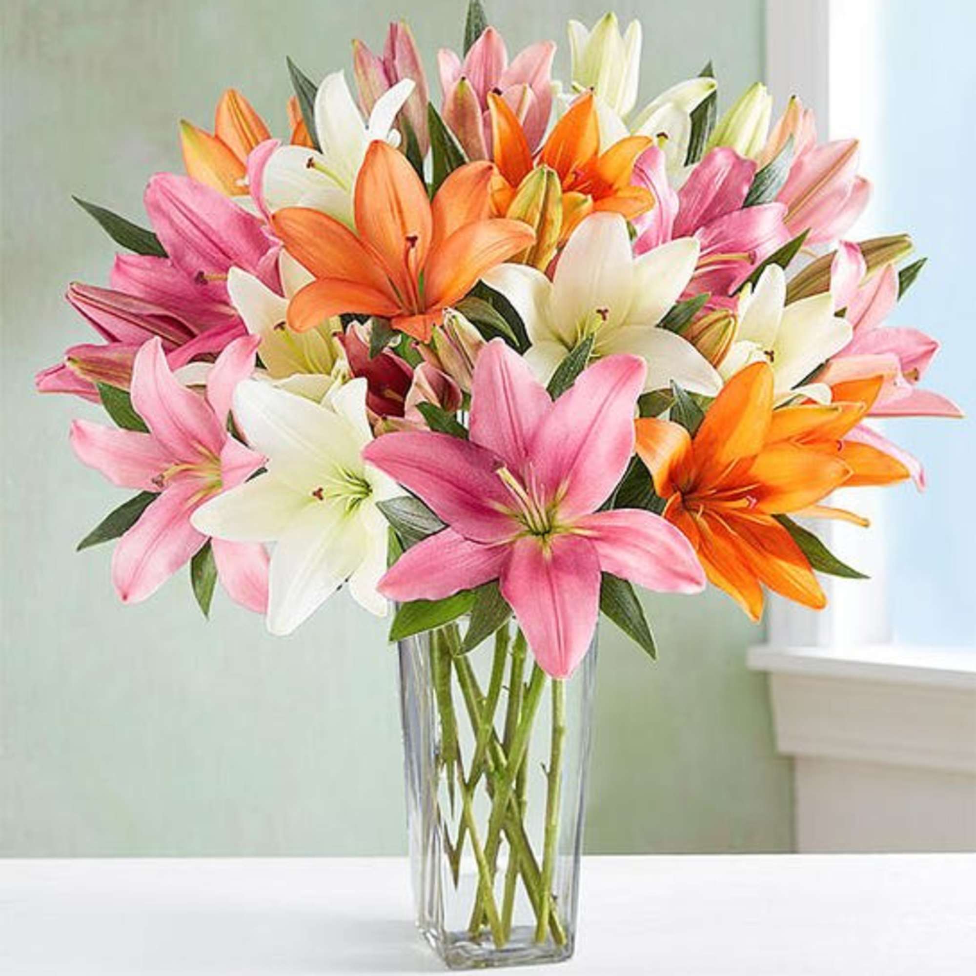 The vibrant beauty of summer comes alive in our lily bouquet. Star-shaped