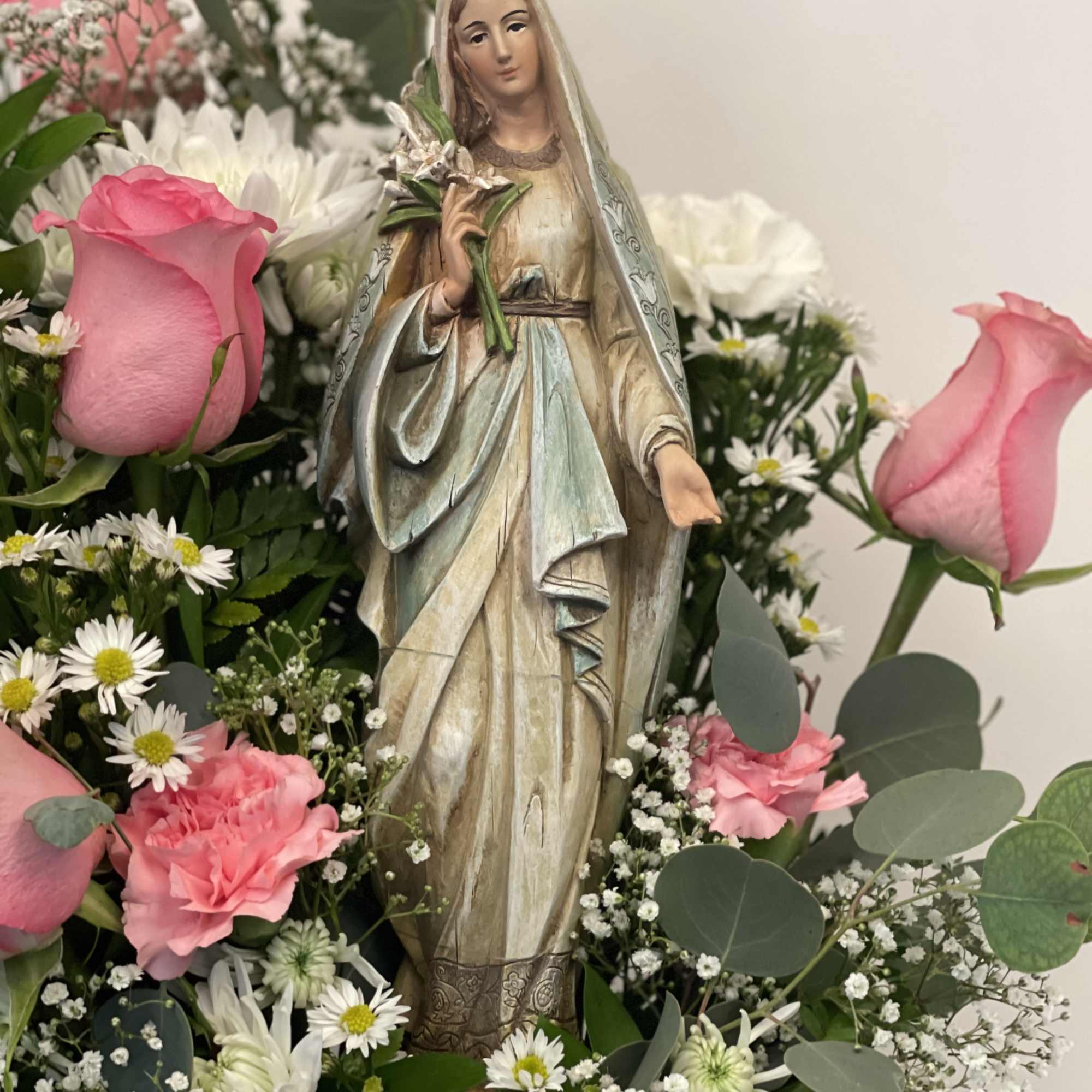 Wooden sculpture of Mary is a keeper 