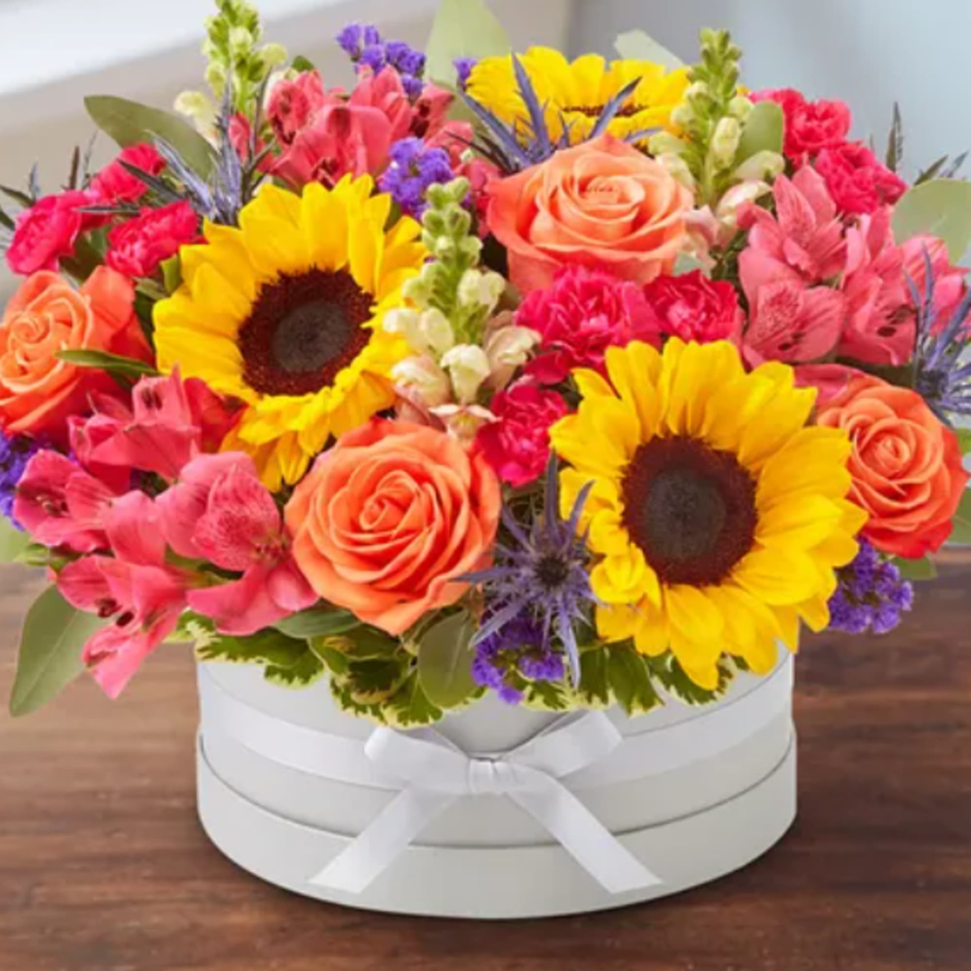 Mixed flowers in box. will be whats available.  box color will Mixed flowers in box. will be whats available.  box color will