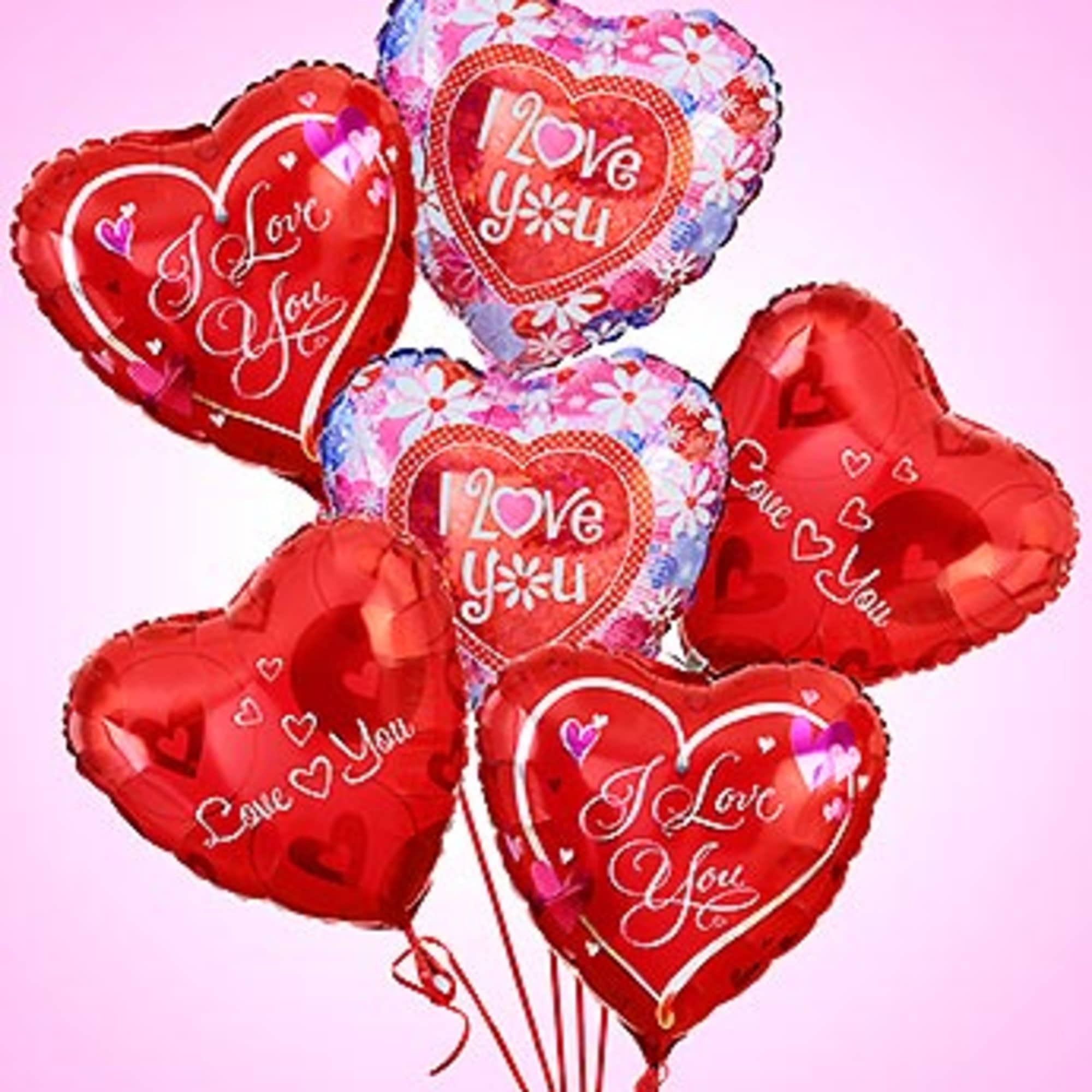 Celebrate love with a bundle of assorted heart balloons. Standard includes 6