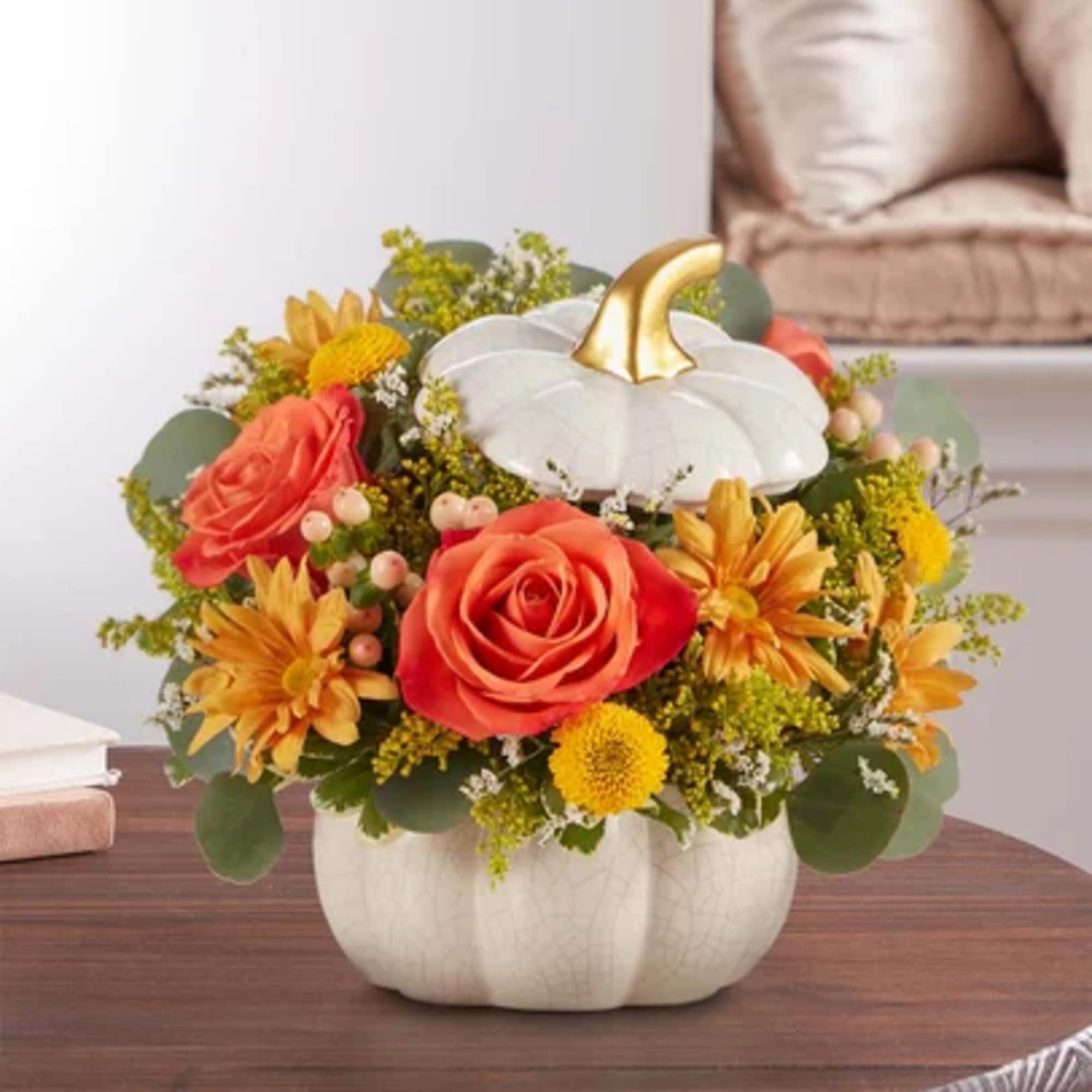 An Autumn themed bouquet in a white pumpkin. From $60. An Autumn themed bouquet in a white pumpkin. From $60.