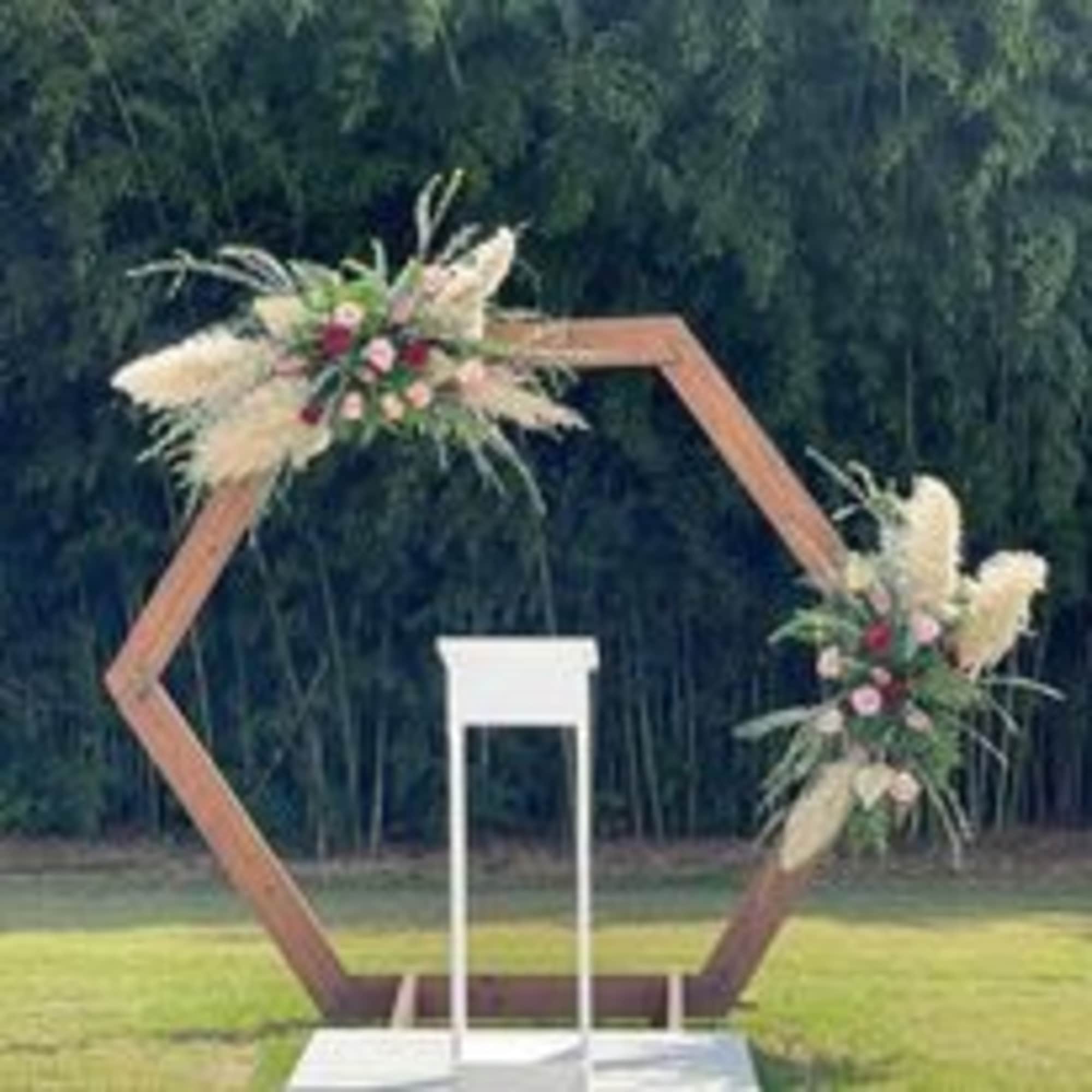 Custom Arches for your wedding day!  All shapes, Sizes and Flowers!