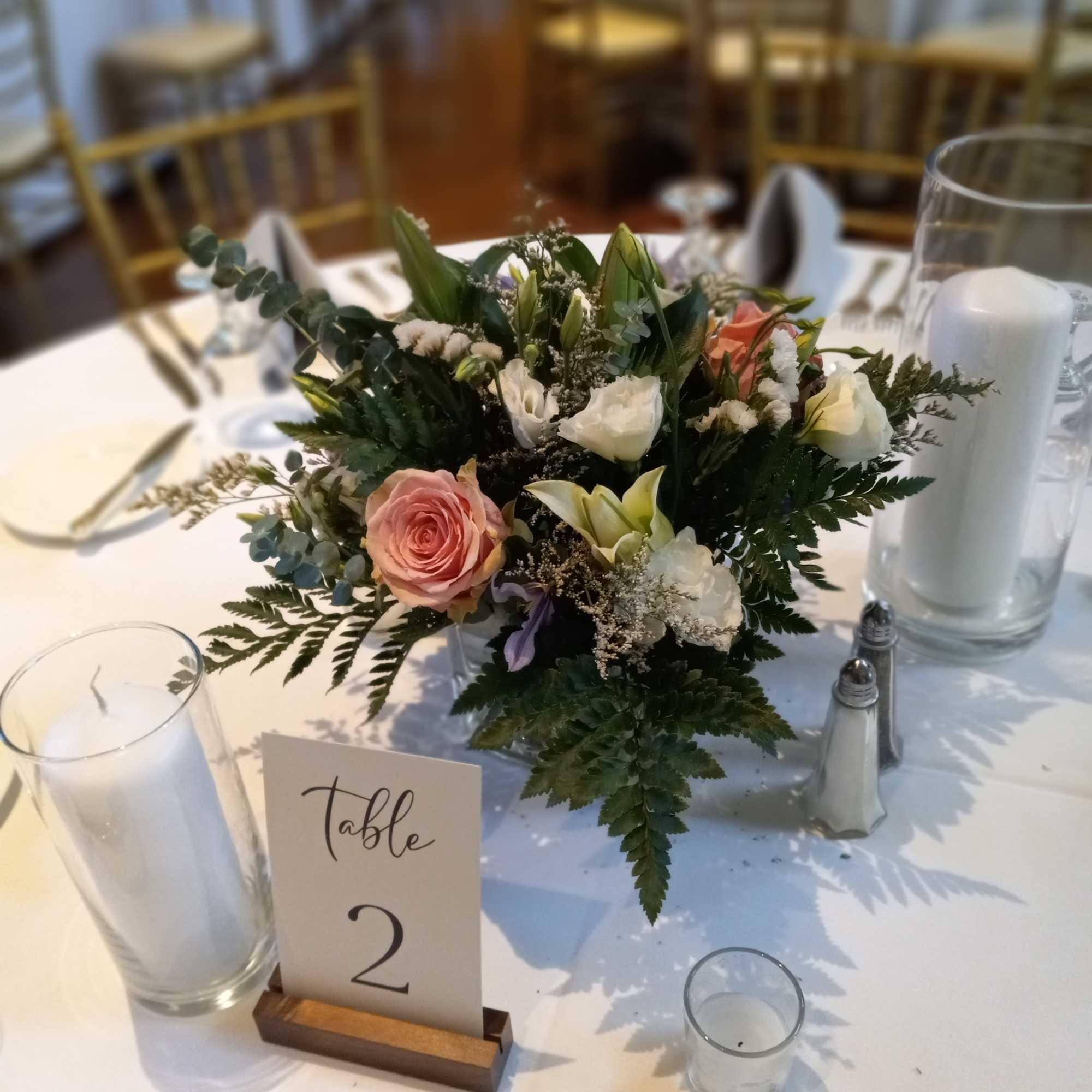 Beautiful addition to the reception, traditional mix ot flowers matching the bridal