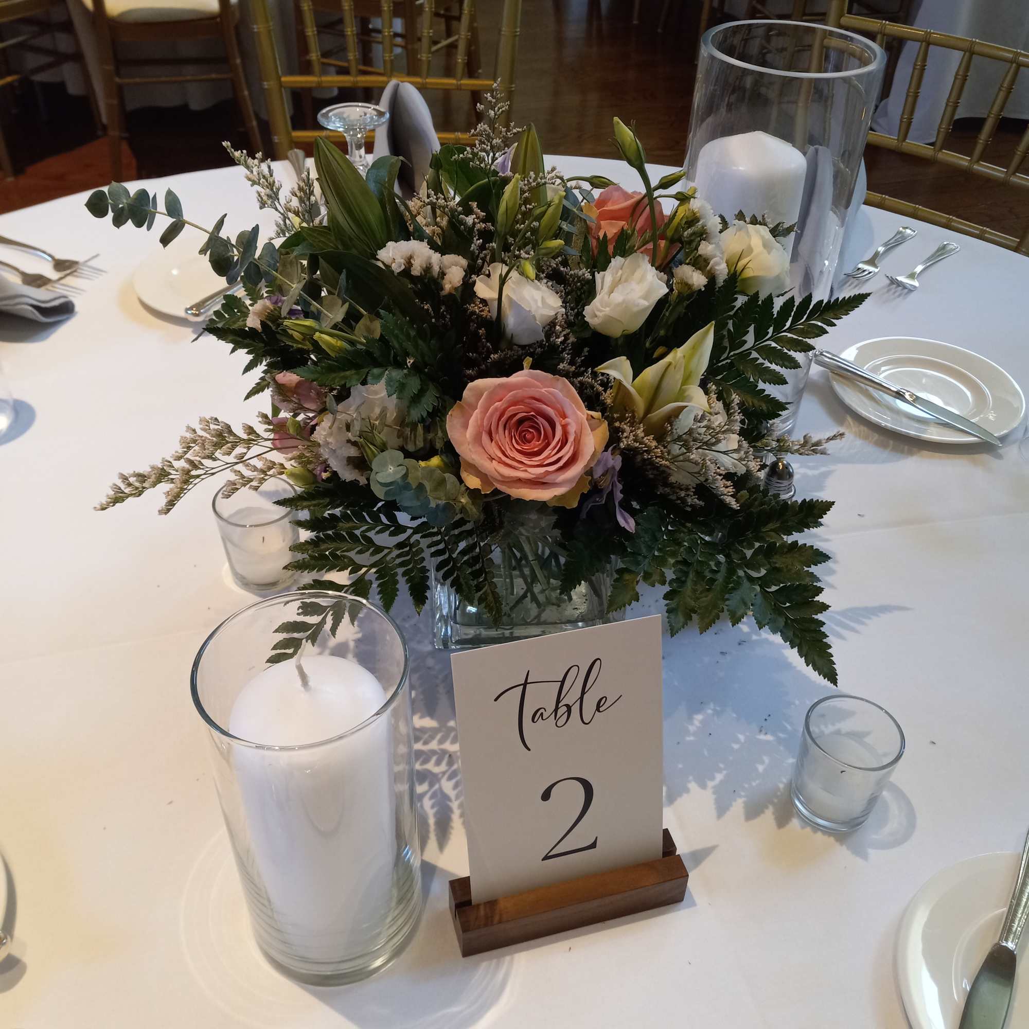 Beautiful addition to the reception, traditional mix ot flowers matching the bridal