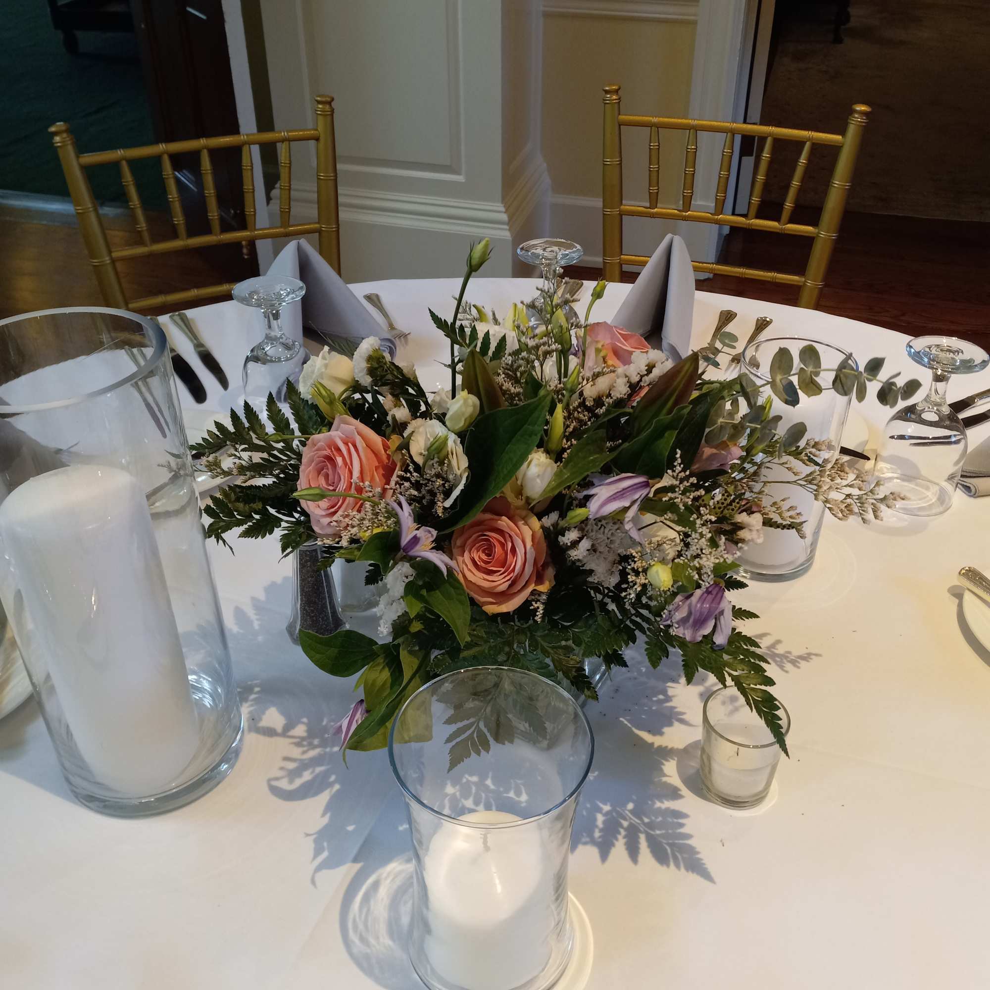 Beautiful addition to the reception, traditional mix ot flowers matching the bridal