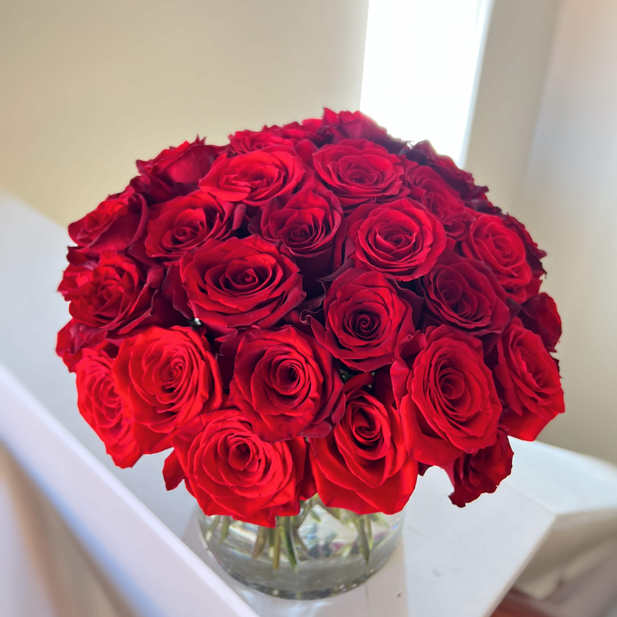 Make a bold statement with this beautifully simple design. Three Dozen Red