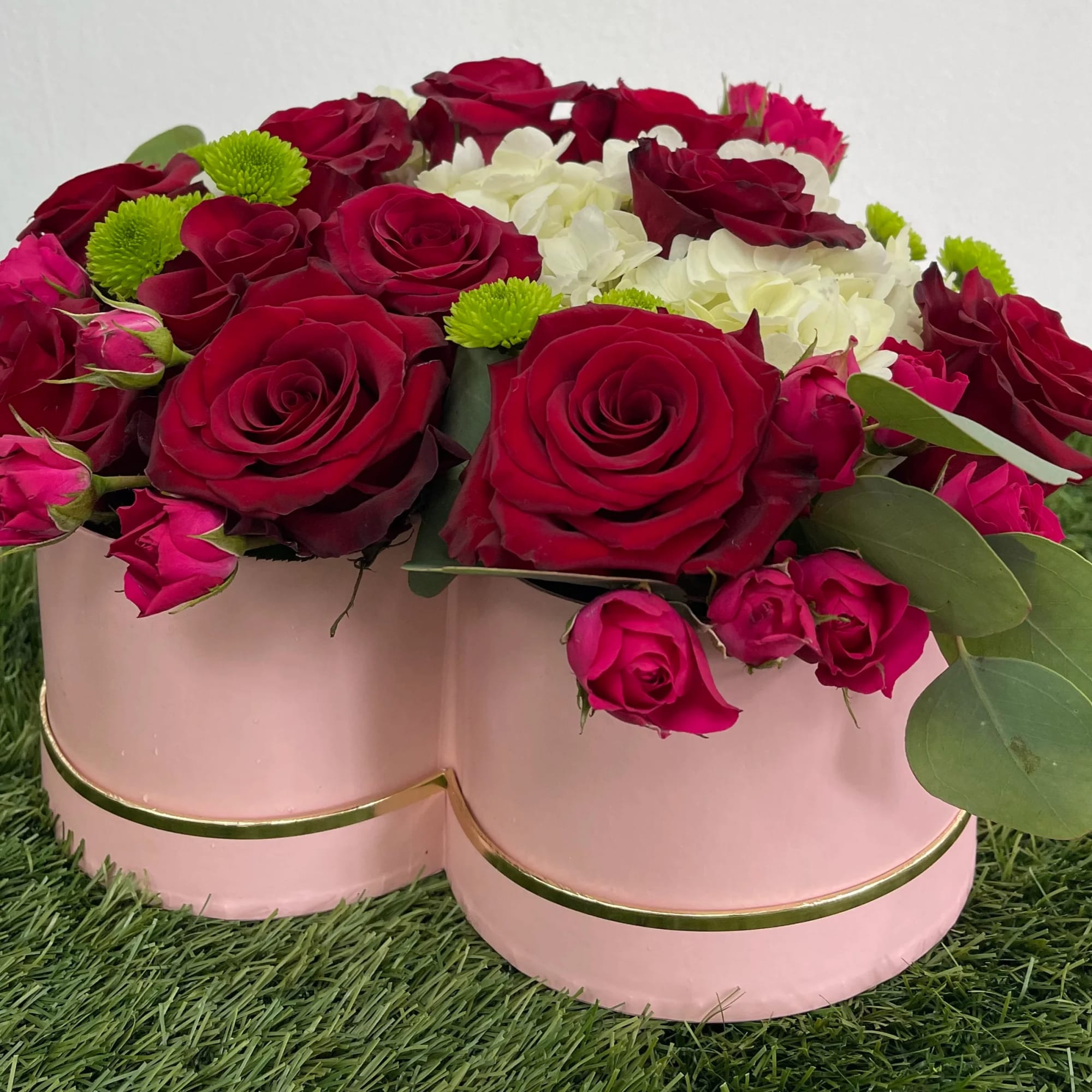 Beautiful heart pink box with mix of roses, spray roses, hydrangea and