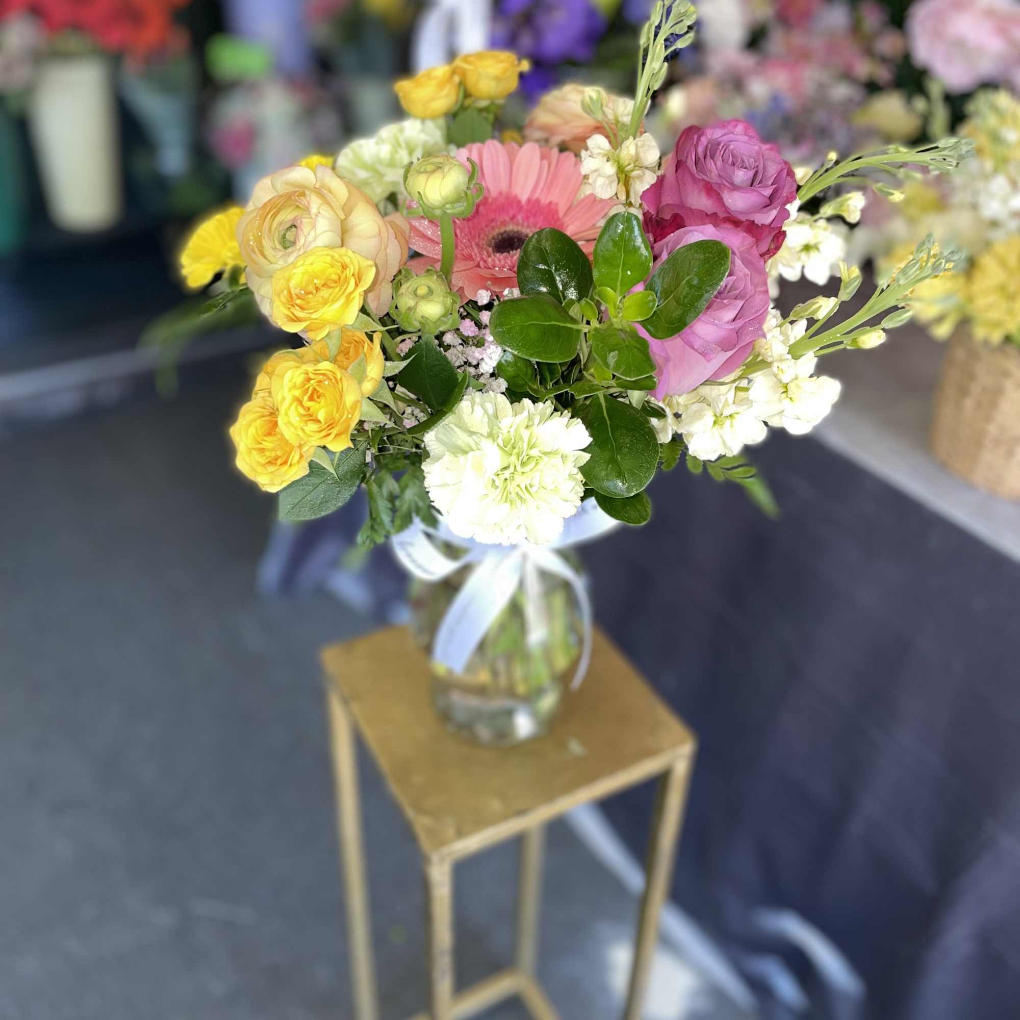 This beautiful arrangement has some nice colors and fresh flowers, this arrangement