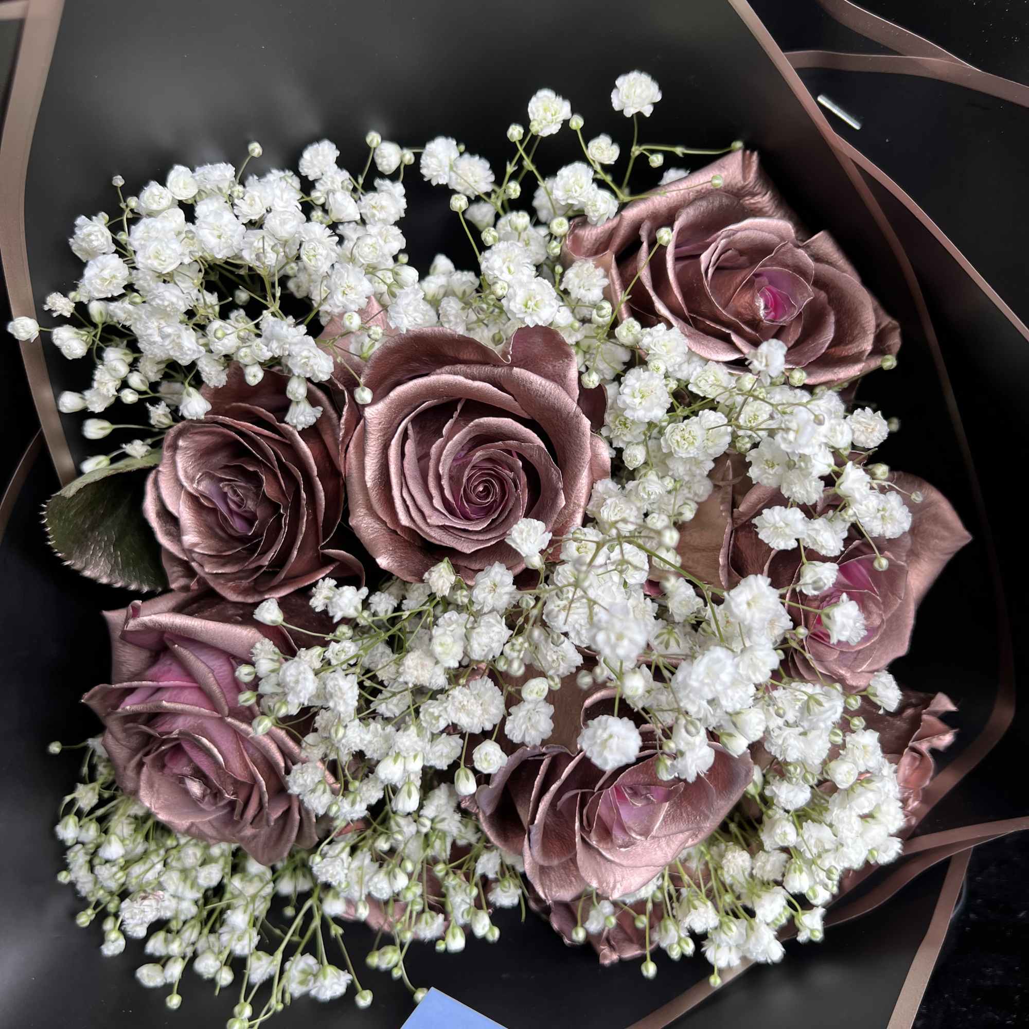 Rose Gold painted roses with babies breath Rose Gold painted roses with babies breath