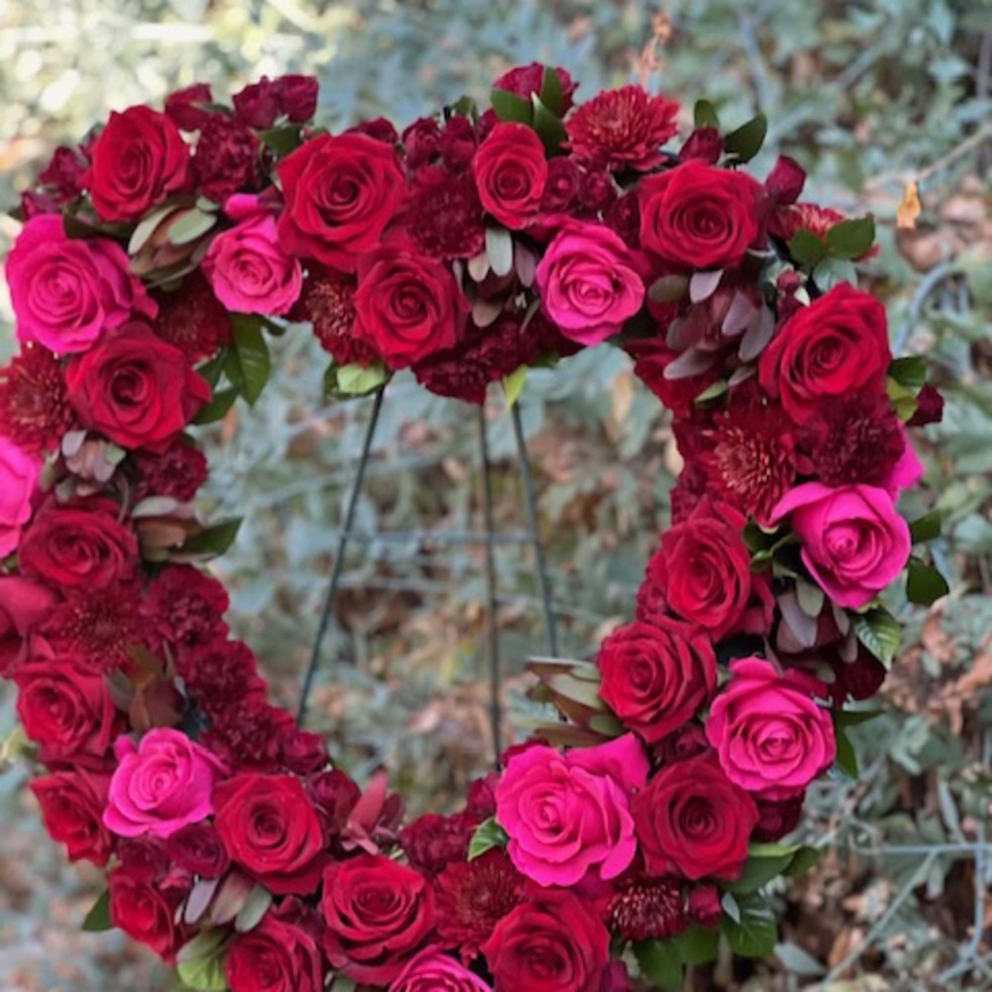 A heart made from a variety of blooms in your color palate.