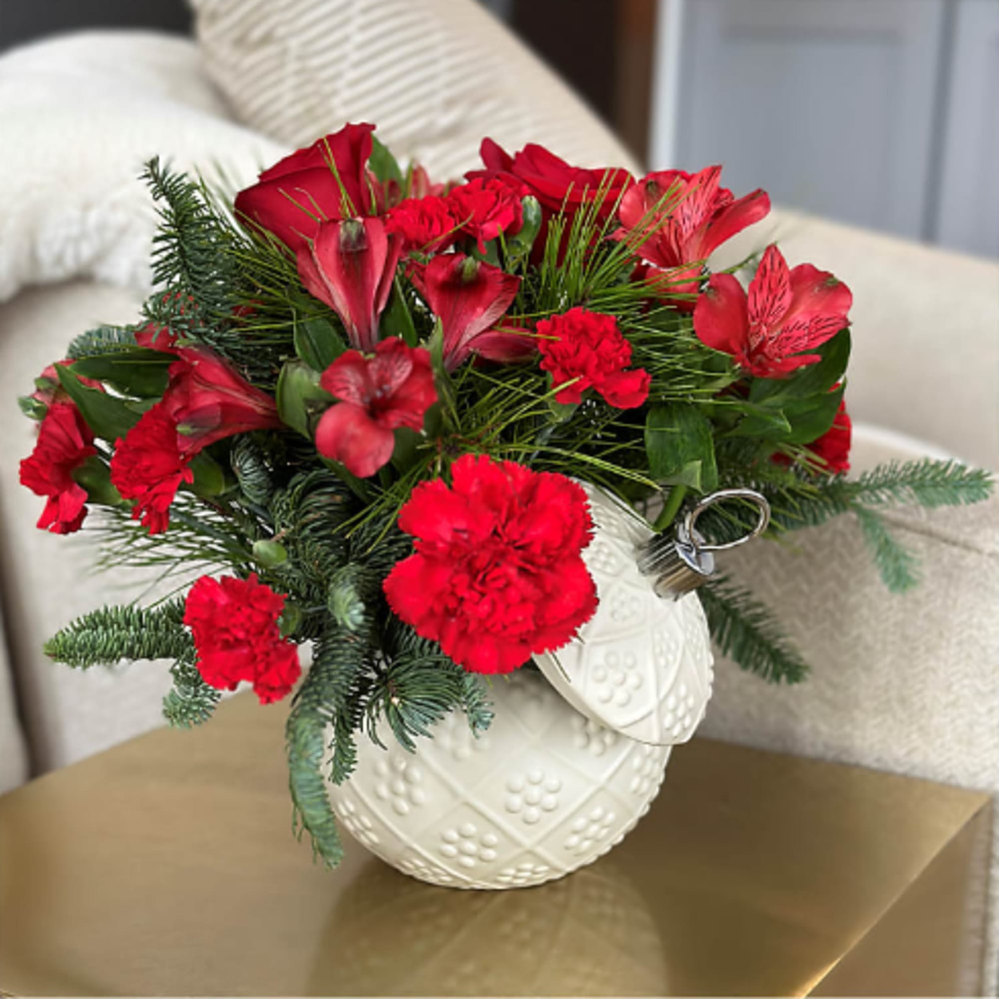 Bursting holiday spirit is elegantly symbolized in this deep red bouquet, where Bursting holiday spirit is elegantly symbolized in this deep red bouquet, where