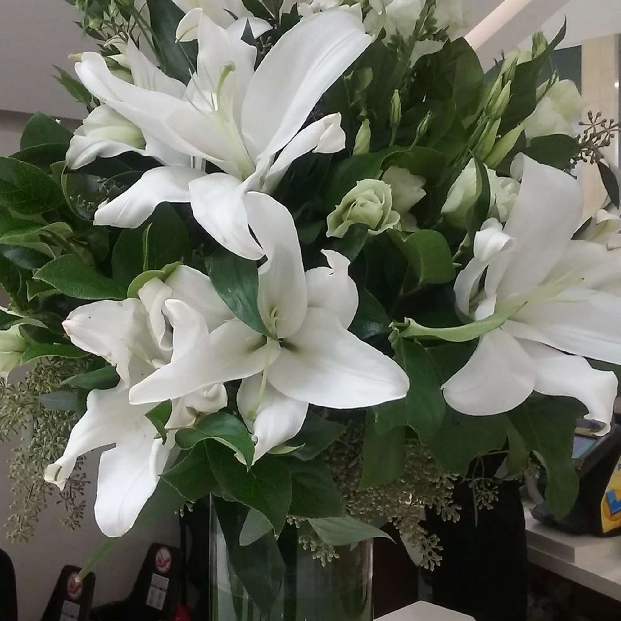 Magnificent premium casablanca lilies in a 2 foot tall vase.  These