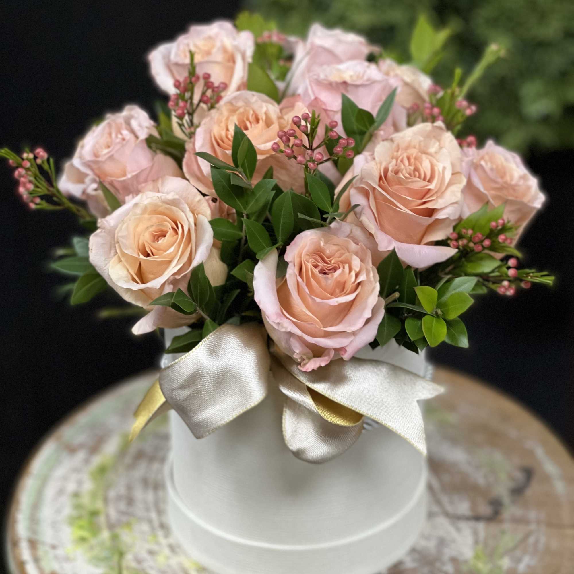 Simply adorable arrangement in a box, perfect for first date or for