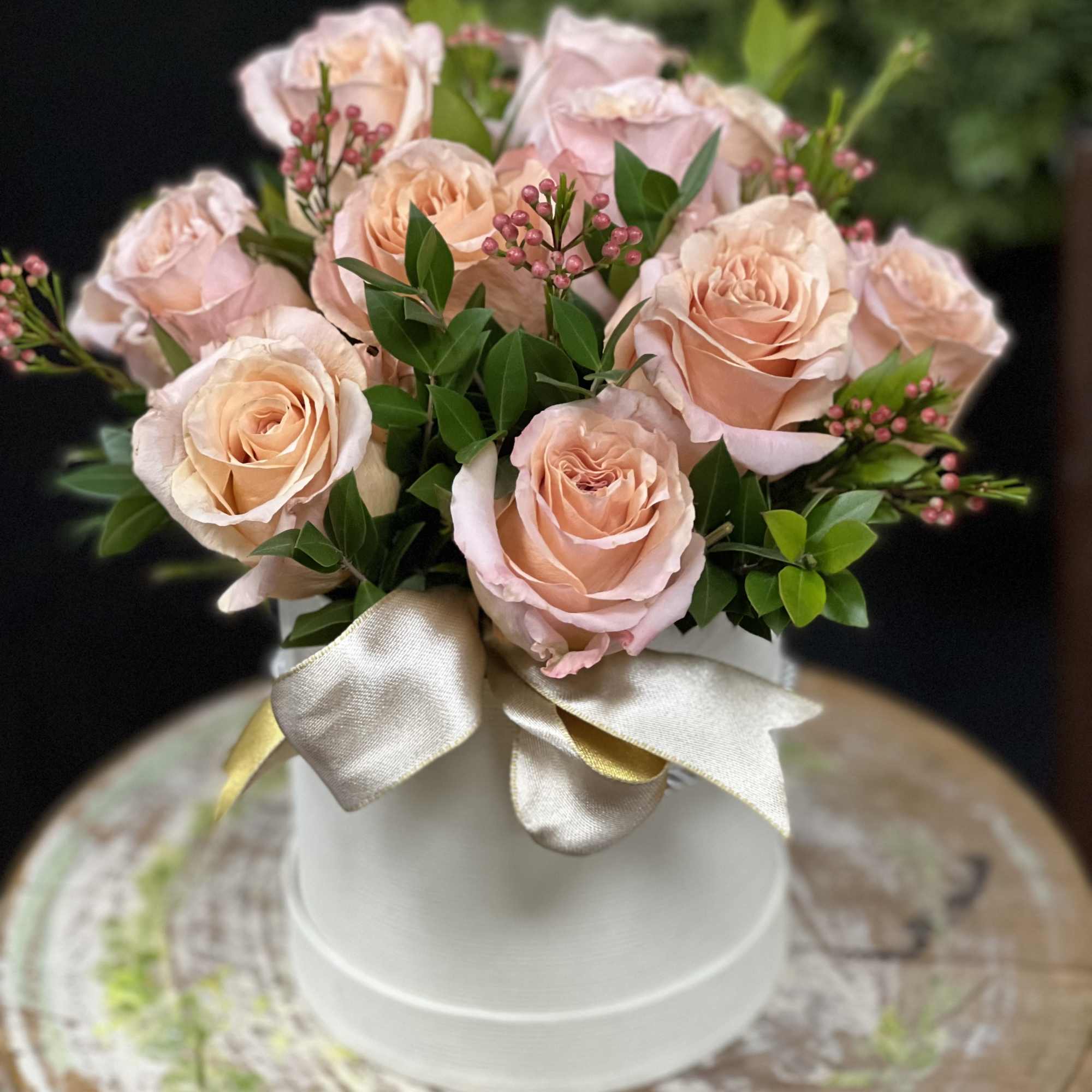 Simply adorable arrangement in a box, perfect for first date or for