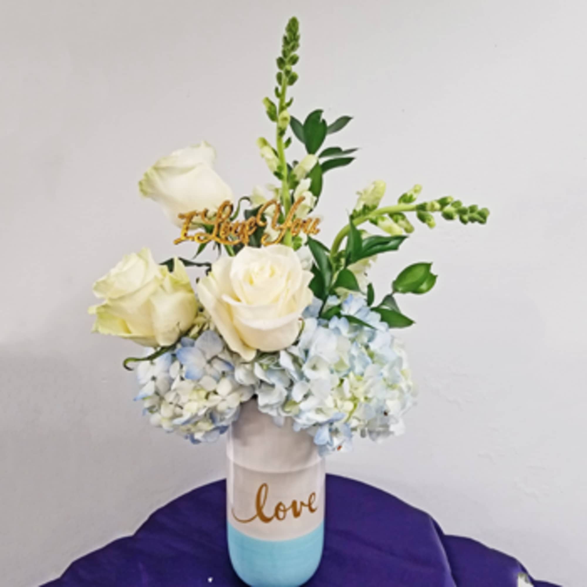 Elegant and simple for your favorite Babe!  Hydrangea, roses, snapdragon in