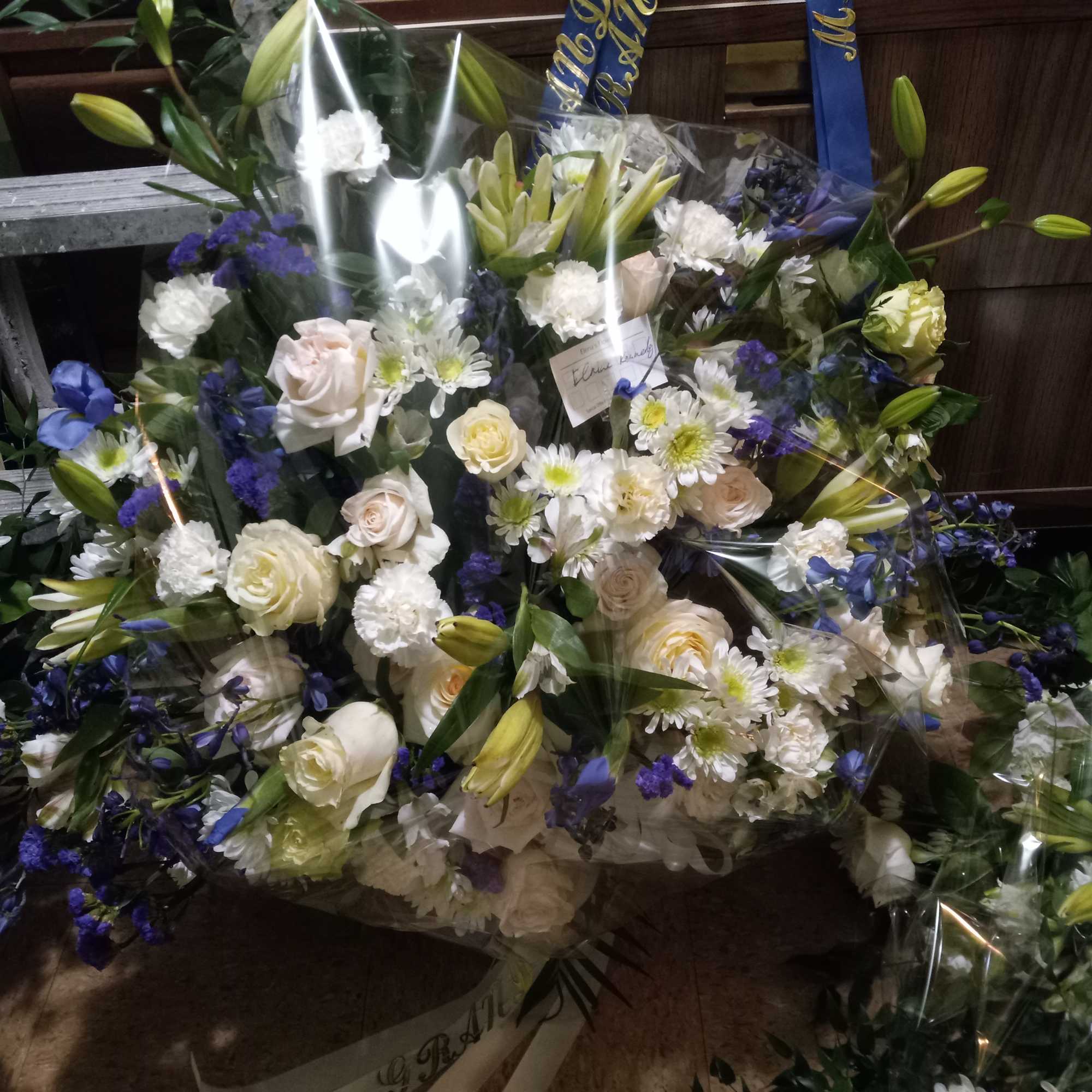 Beautiful white roses, daisies, hydrangea, lilies, alstroemeria &amp; navy/blue irises, delphinium and
