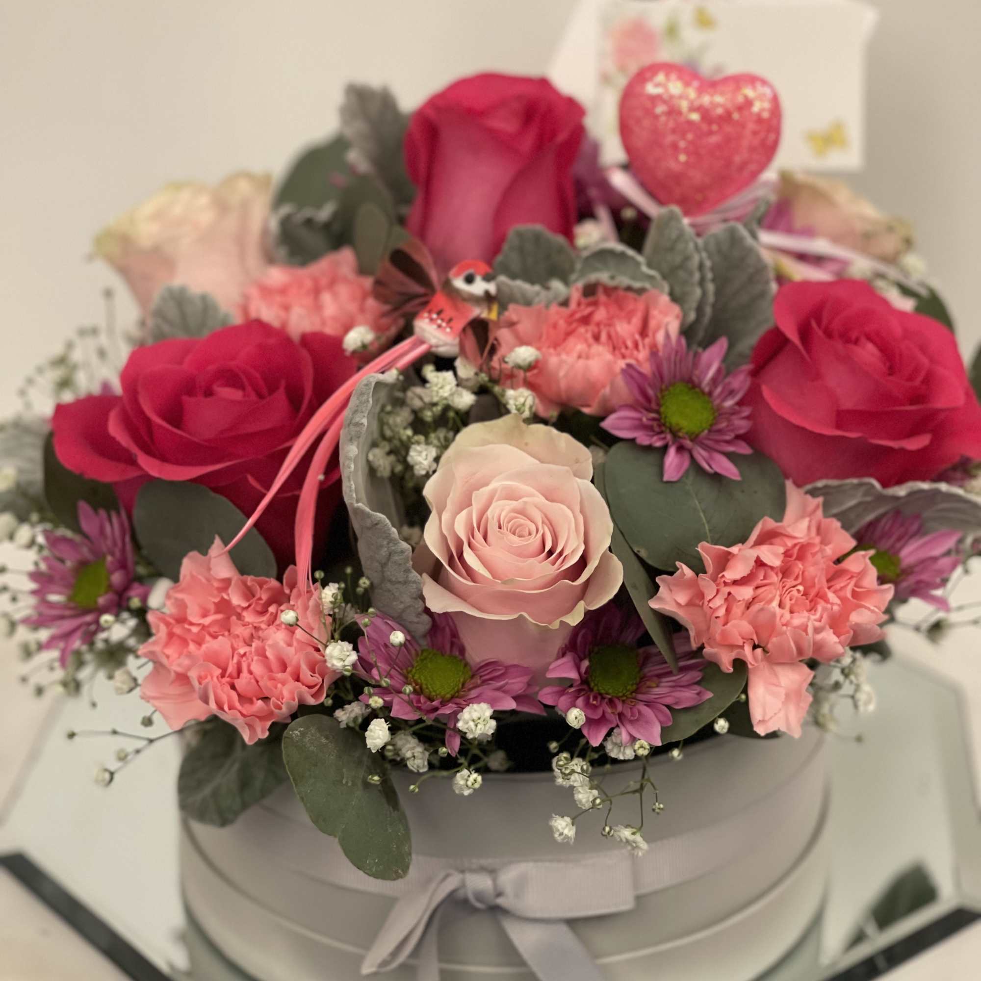 Made in grey cardboard hat box 