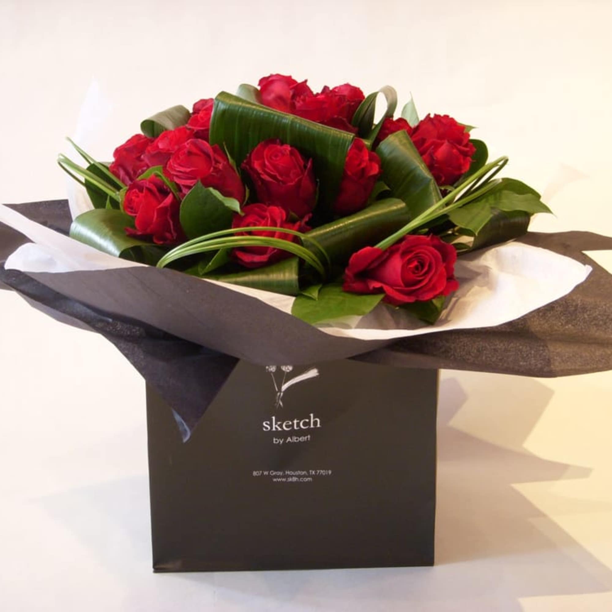 Our famous signature red roses bouquet. The 36 rose bouquet include a