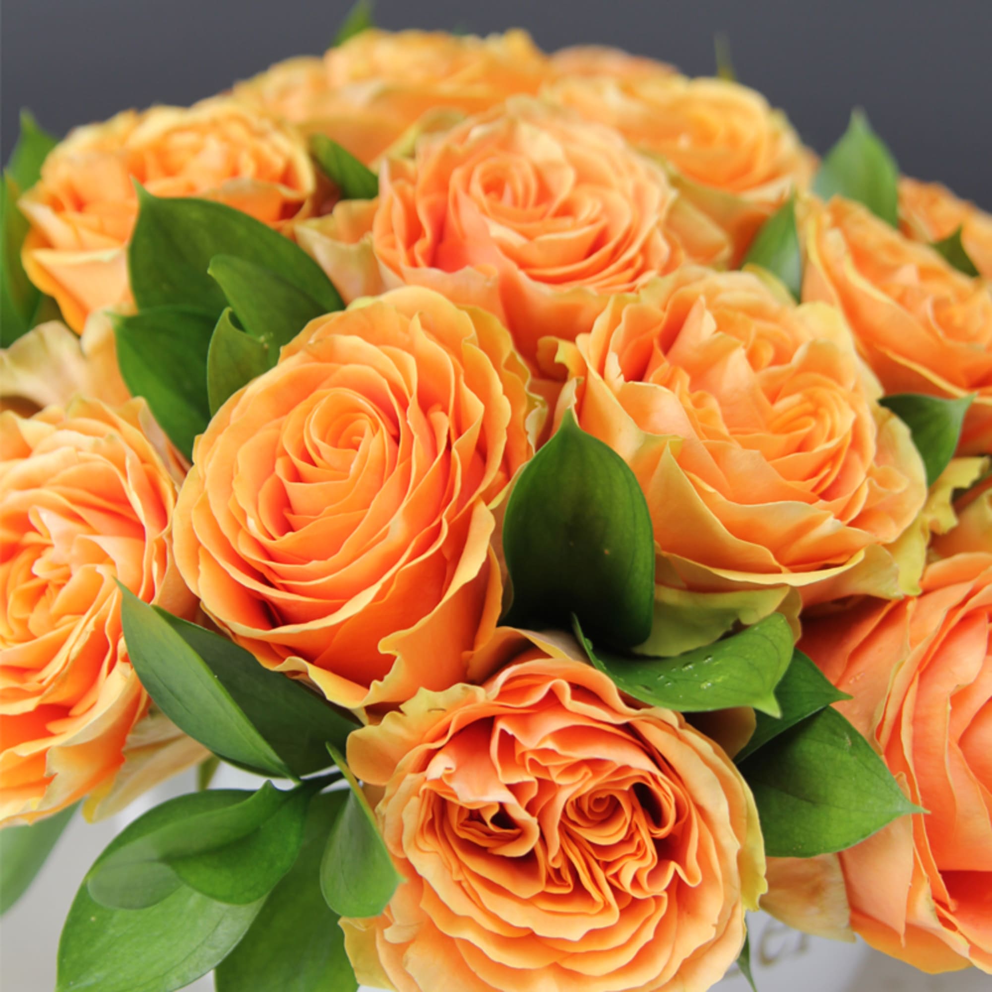 Garden roses in a custom LeFleur Vase. Many colors are available: Yellow