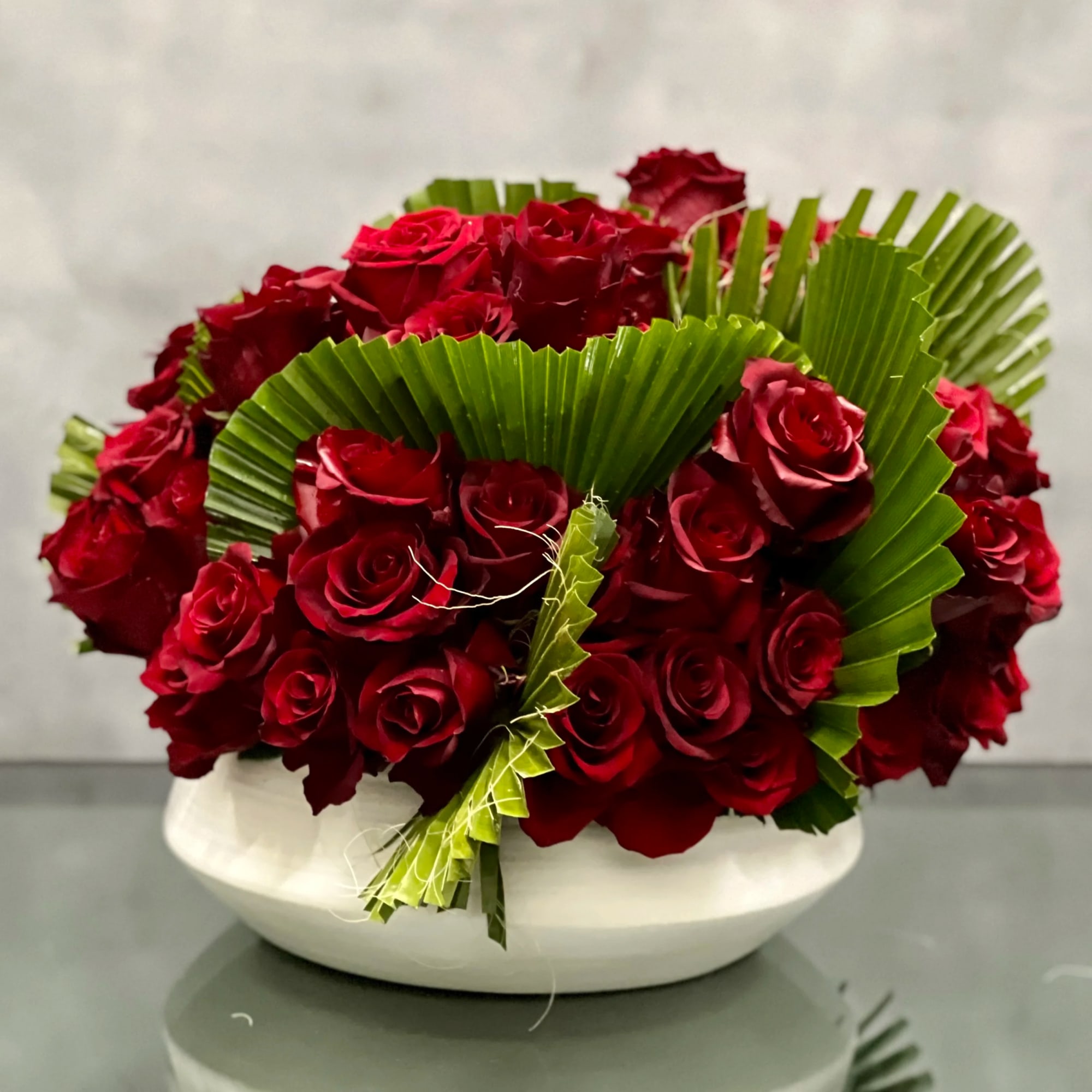 Rich, romantic, lovely deep red Roses create a stunning and abundant design.