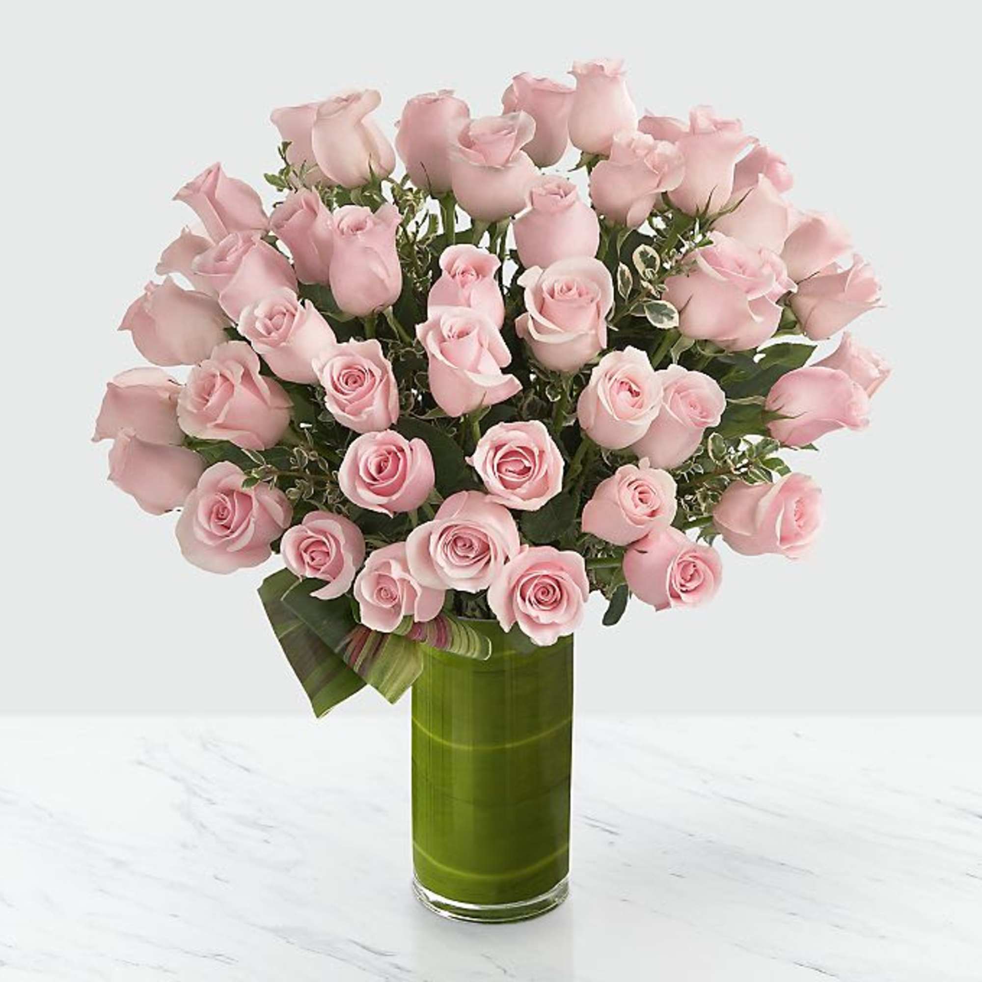 Picture-perfect soft pink roses make a beautiful gift for the lovely lady Picture-perfect soft pink roses make a beautiful gift for the lovely lady