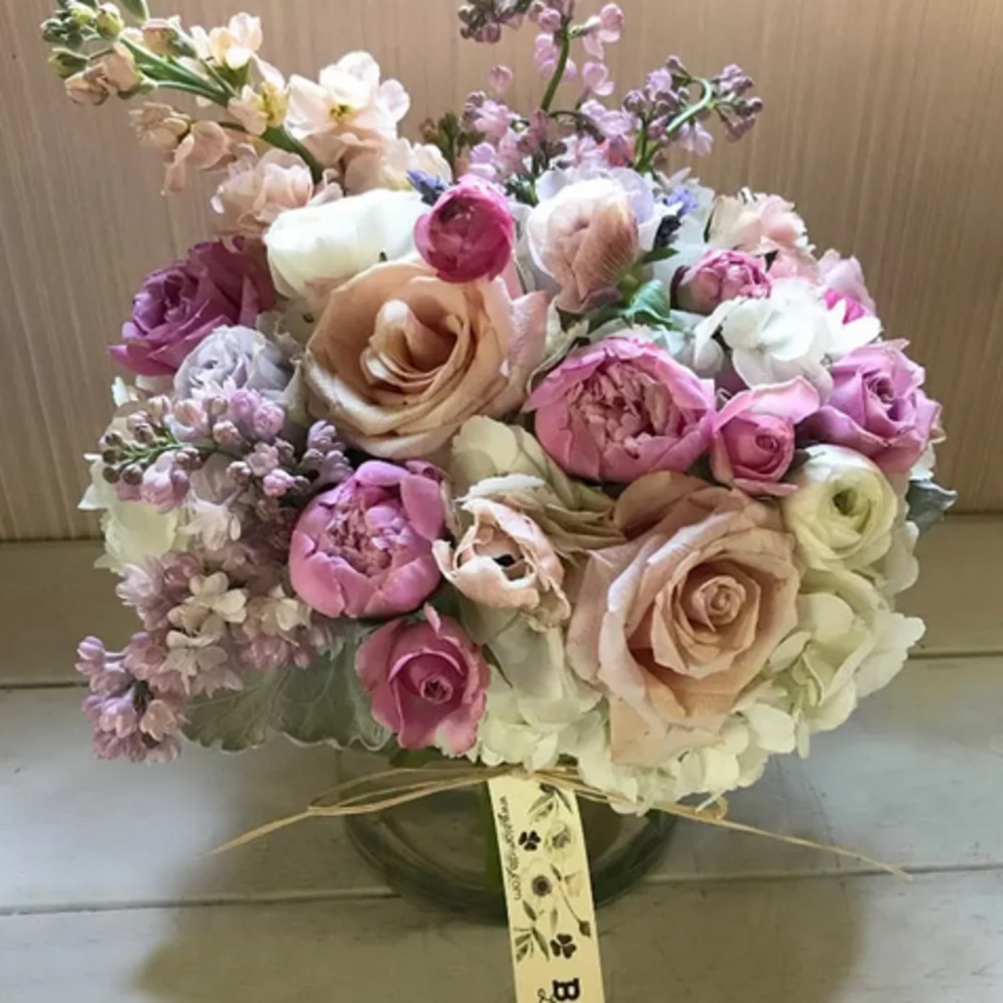 Get a beautiful, fresh medium sized Blomst arrangement of seasonal pastels or Get a beautiful, fresh medium sized Blomst arrangement of seasonal pastels or