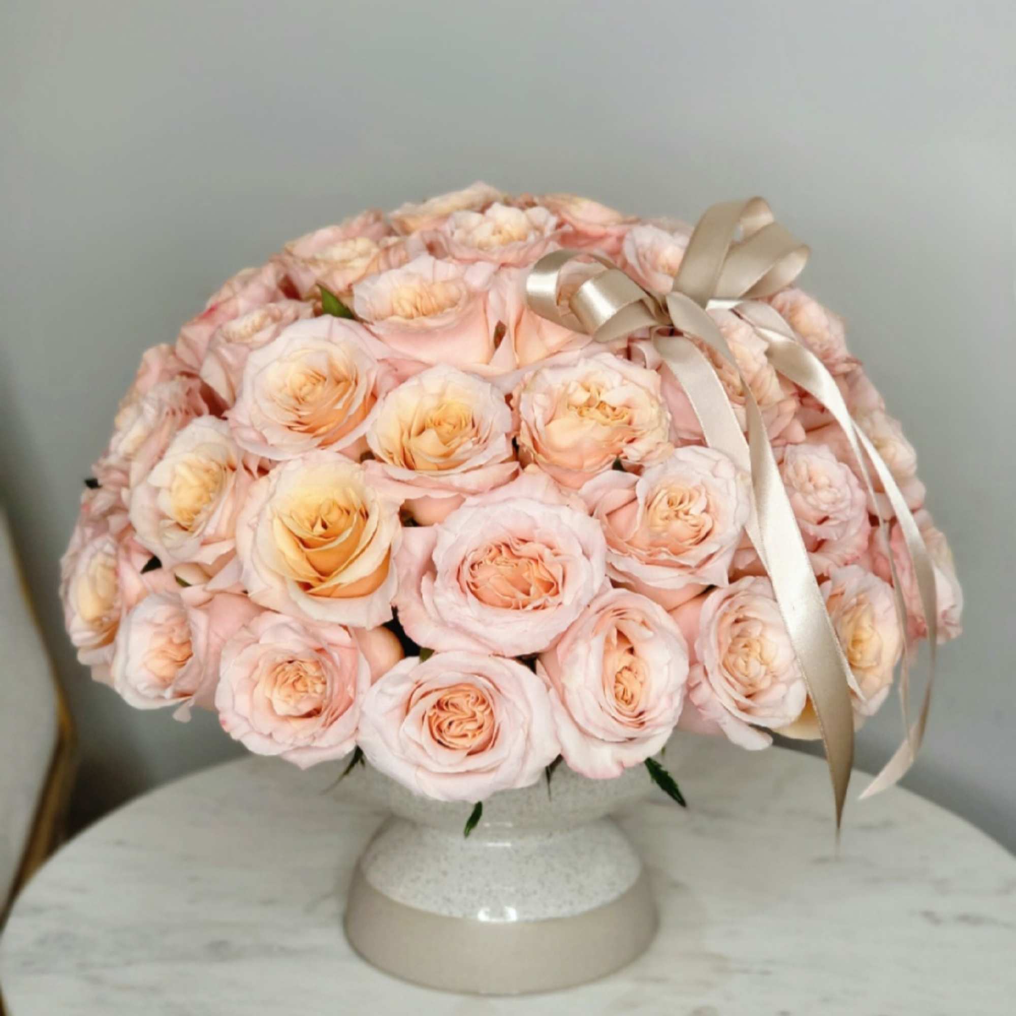 Peach roses are flowers of delicate and warm pink&ndash;orange colors, having an