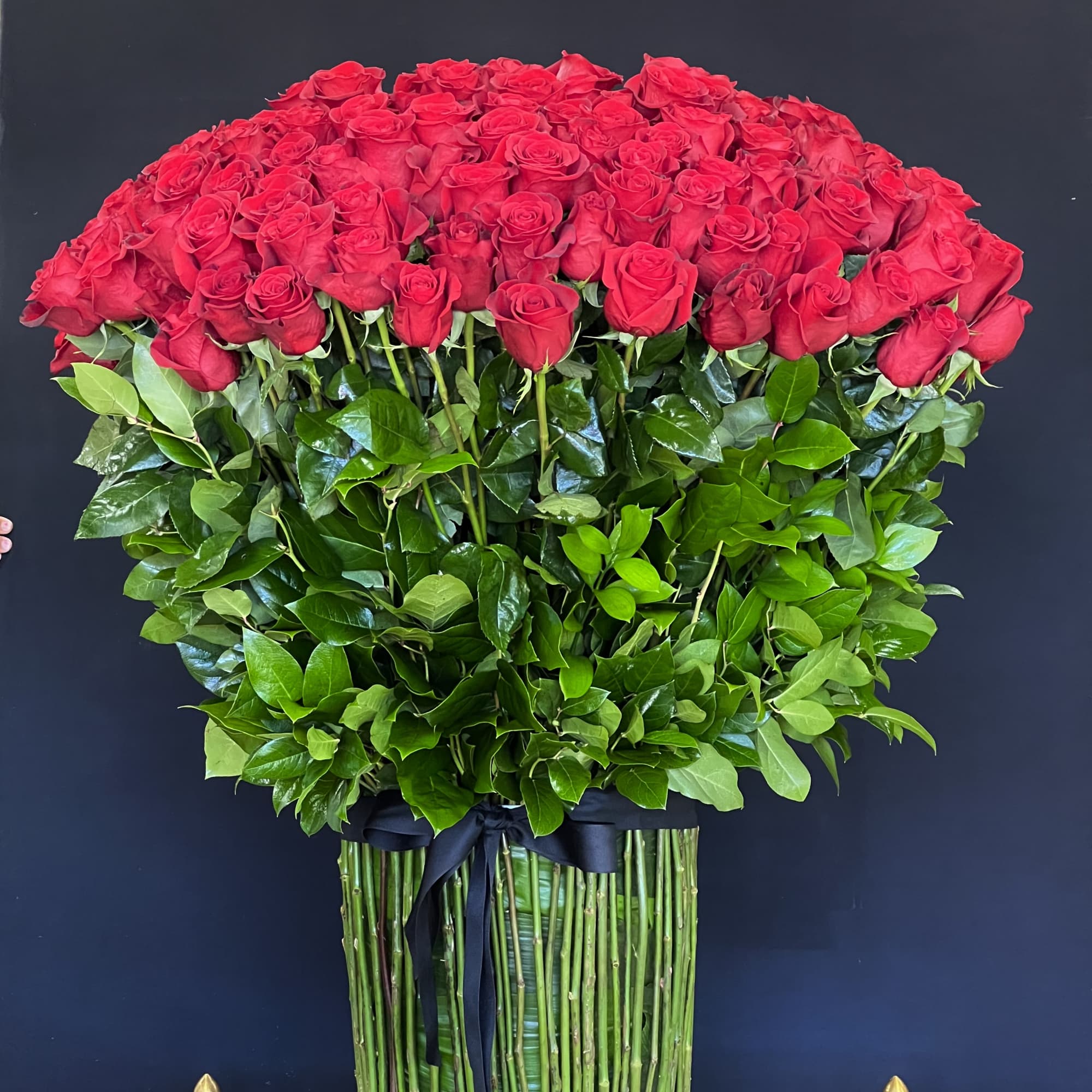 Red roses are the star in this beautiful arrangement
