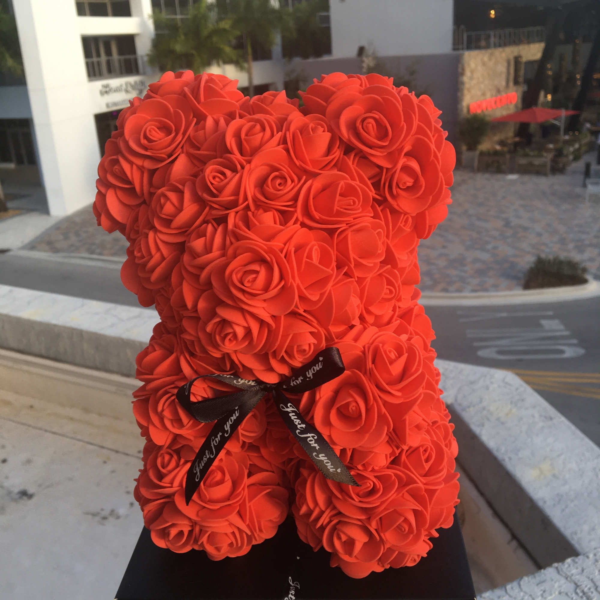 Stunning red rose bear made of soft synthetic roses. These custom-made bears