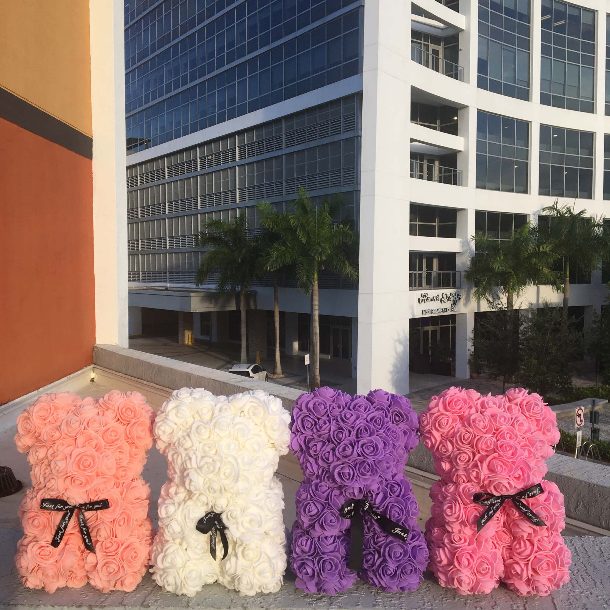 Stunning purple rose bear made of soft synthetic roses. These custom-made bears