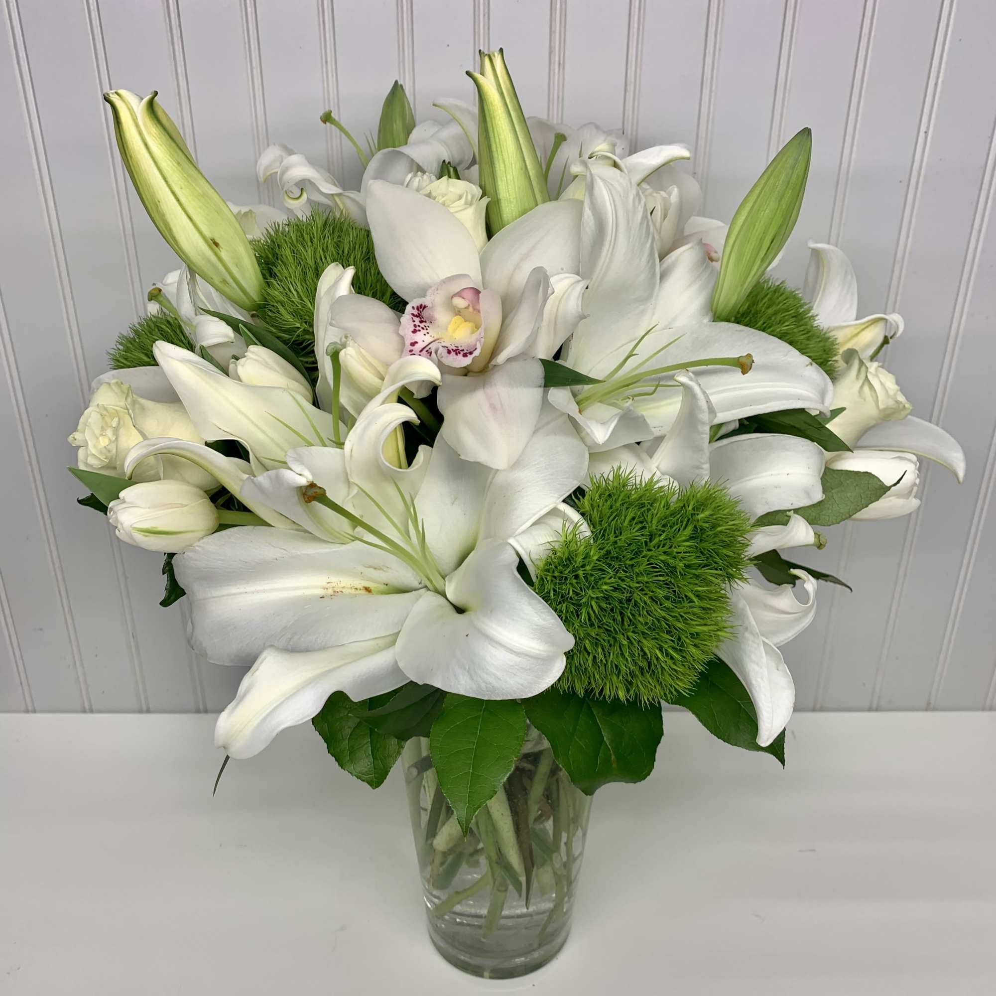 Like a vacation for the senses this lovely bouquet delivers an oasis