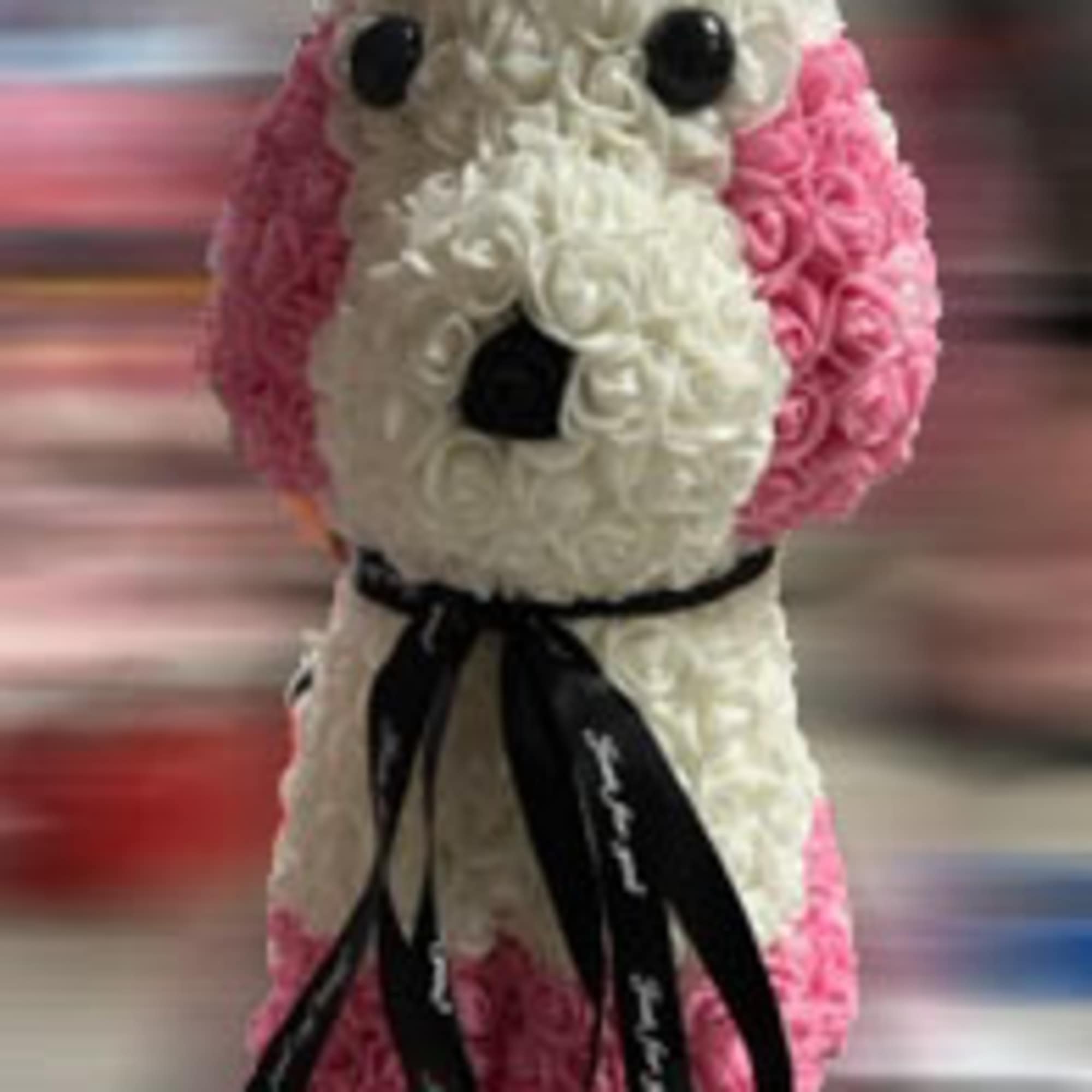 Give someone you love a Stunning puppy done with faux roses  Give someone you love a Stunning puppy done with faux roses