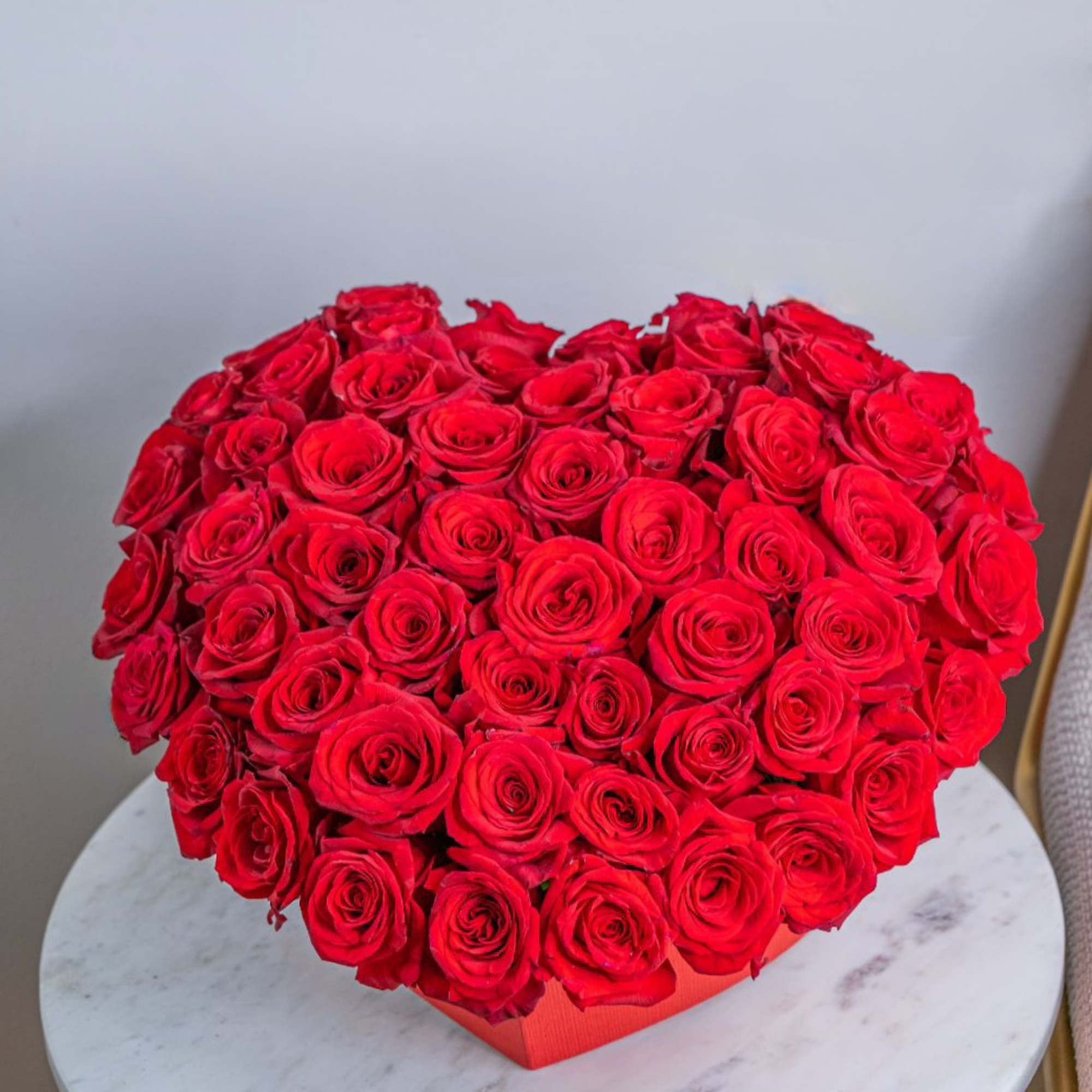 Flowers in a box is a romantic gift for any celebration. Such