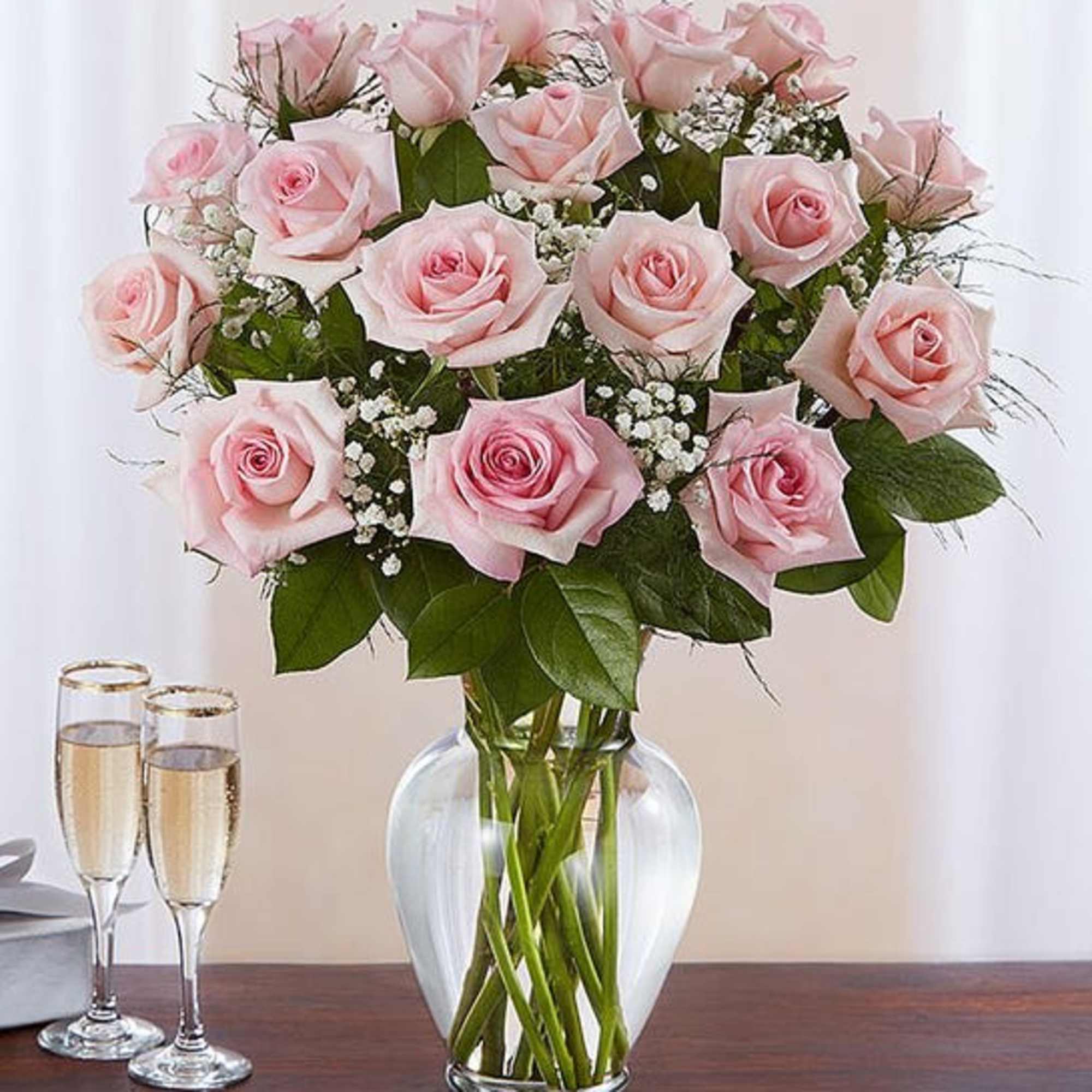 Our elegant pink roses are a charming surprise for someone you care